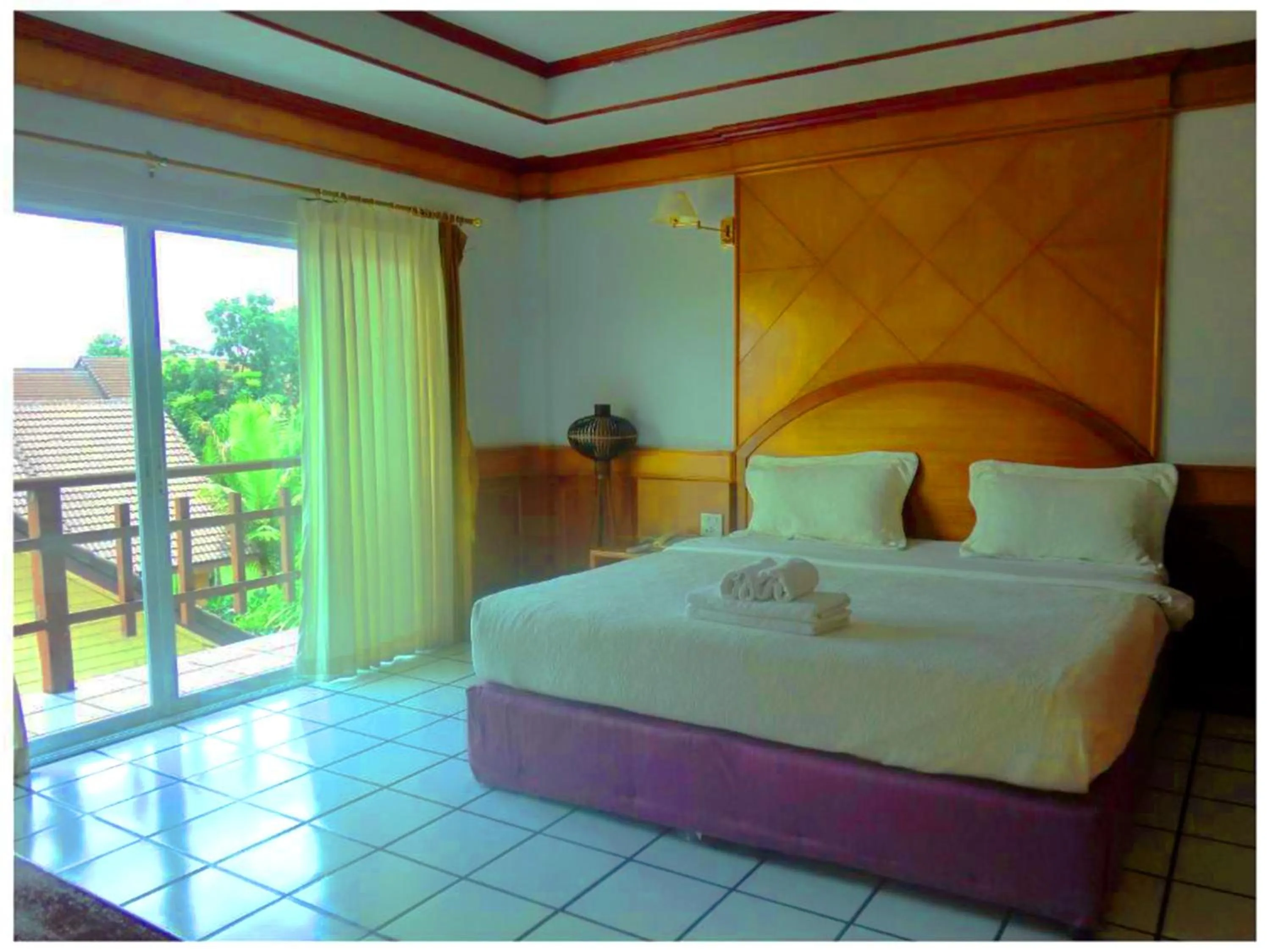 Bed in Thong Paeka Hotel