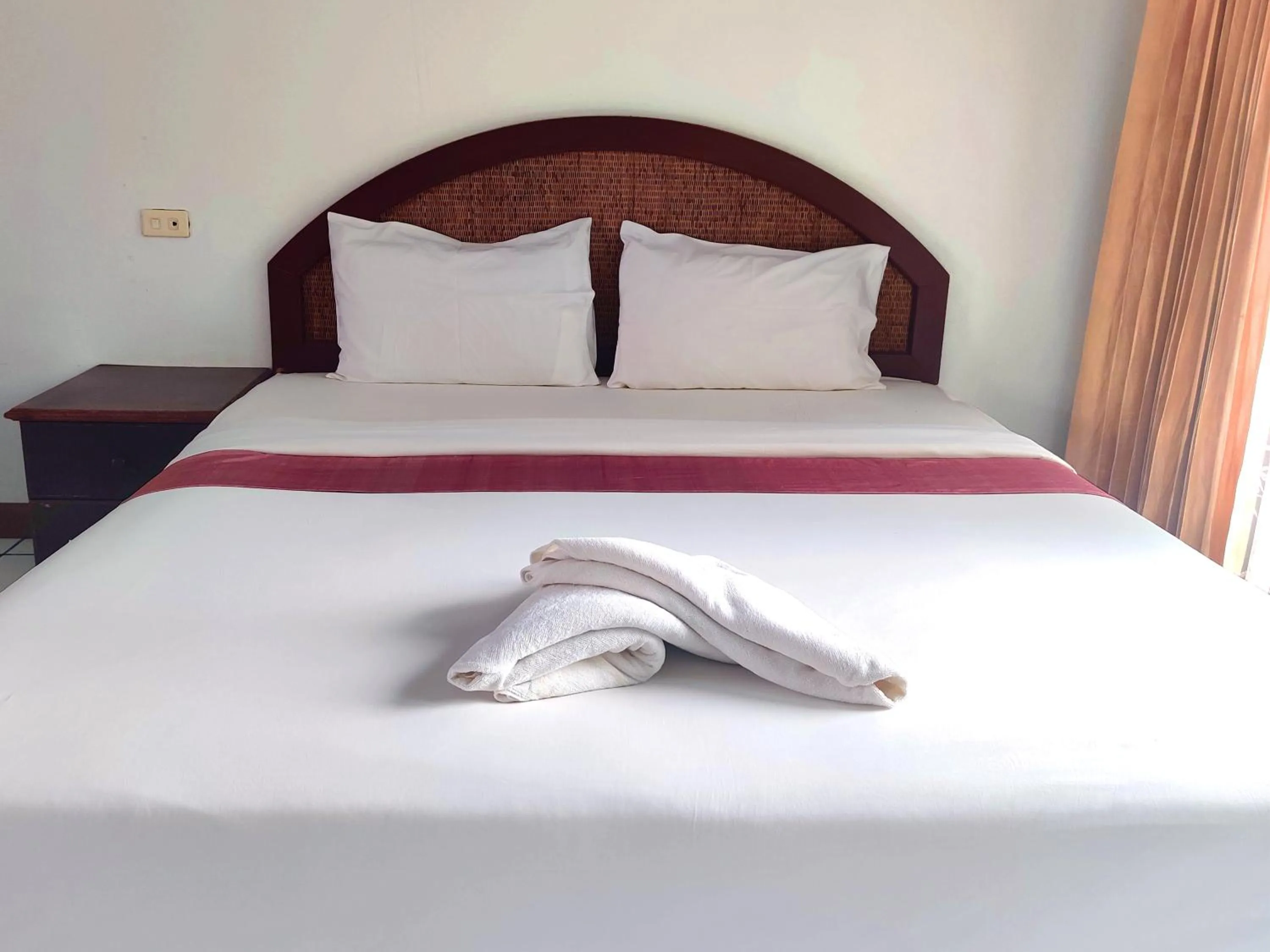 Bed in Thong Paeka Hotel