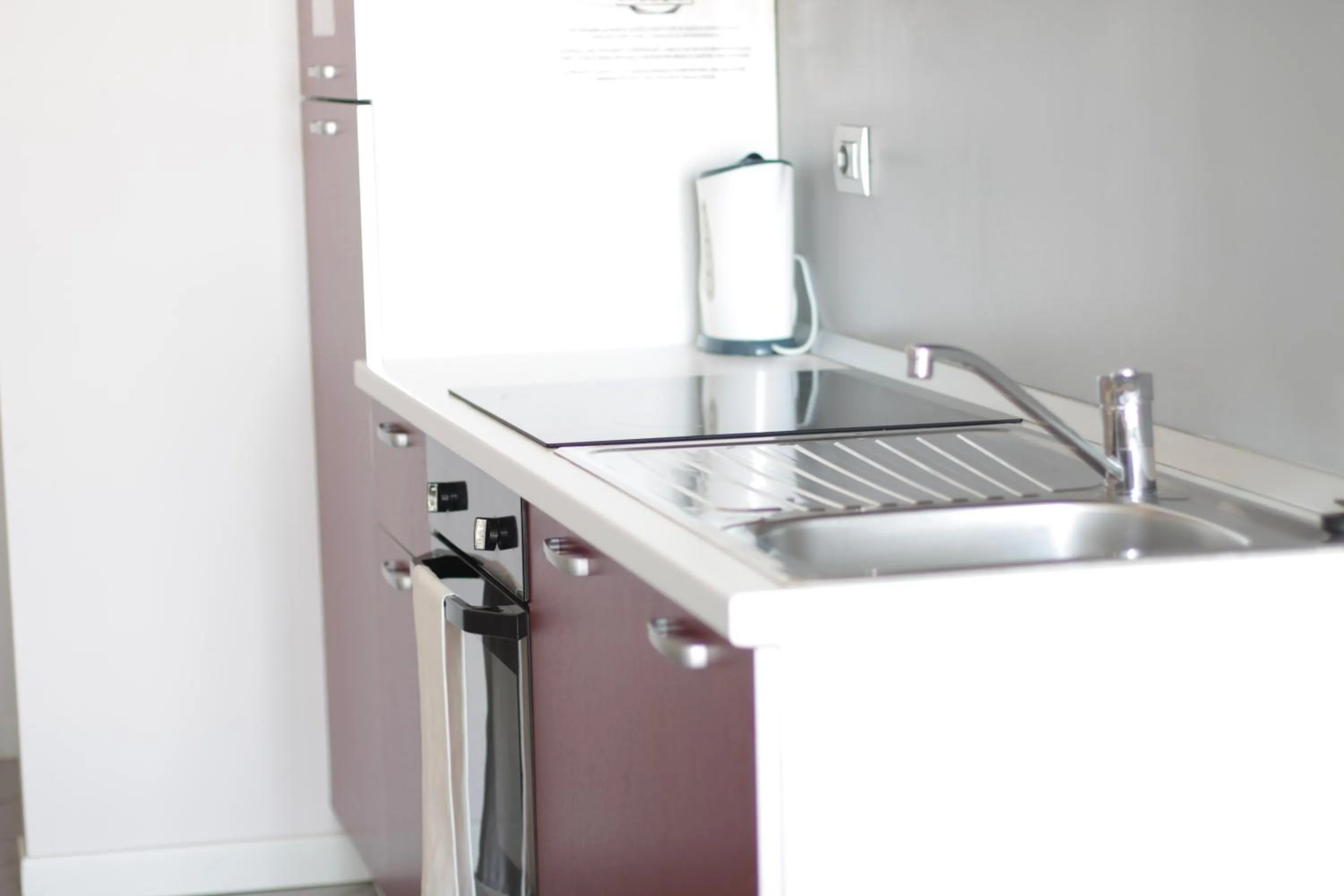 Kitchen or kitchenette in The Residence Galliate