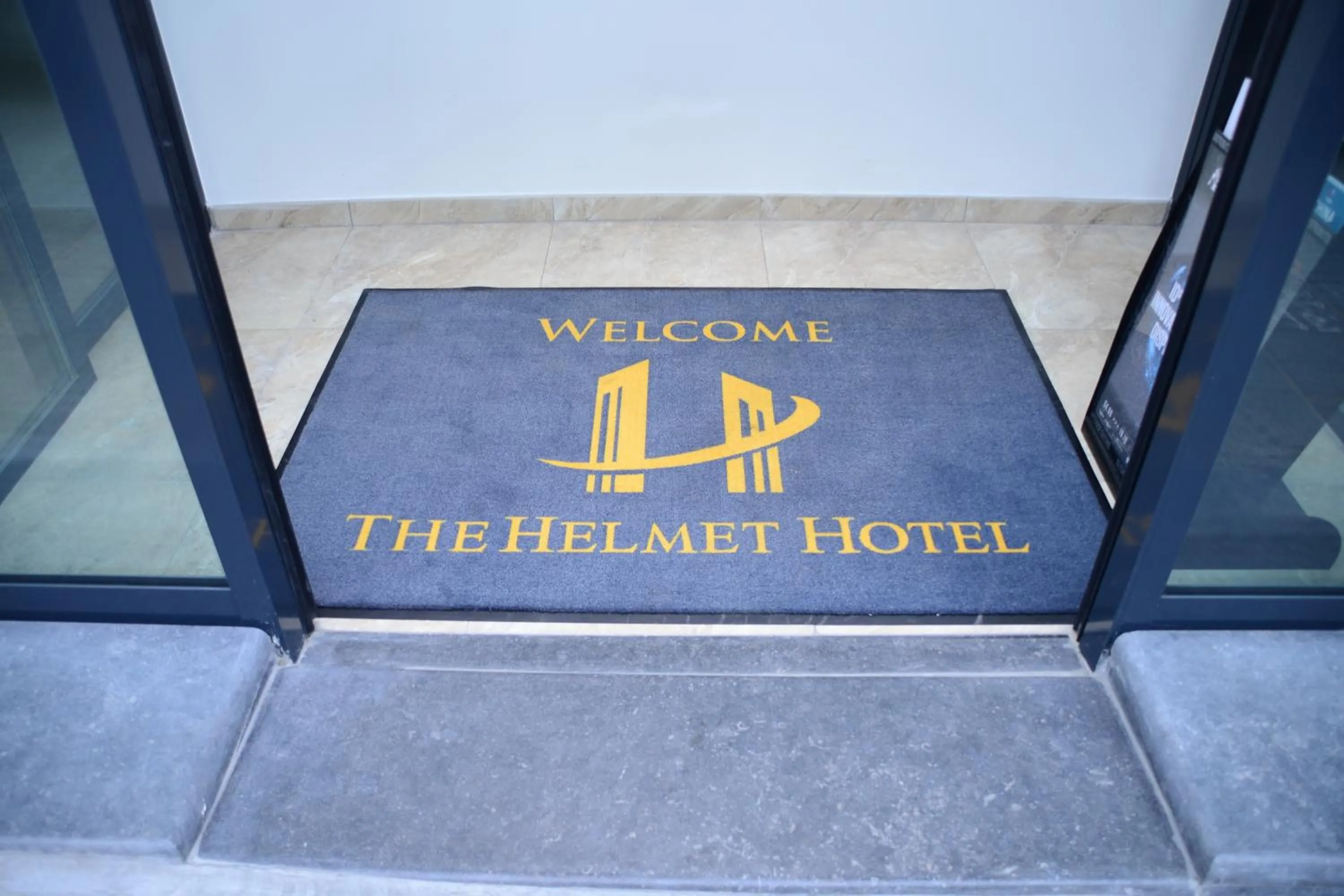 Property logo or sign in The Helmet Hotel