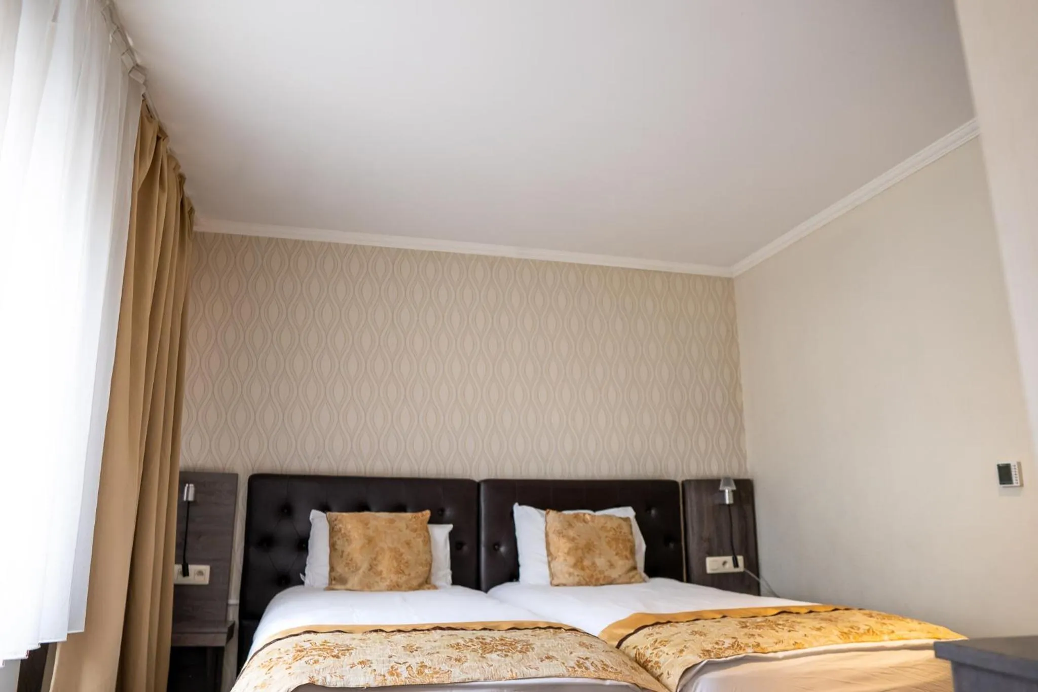 Bed in The Helmet Hotel