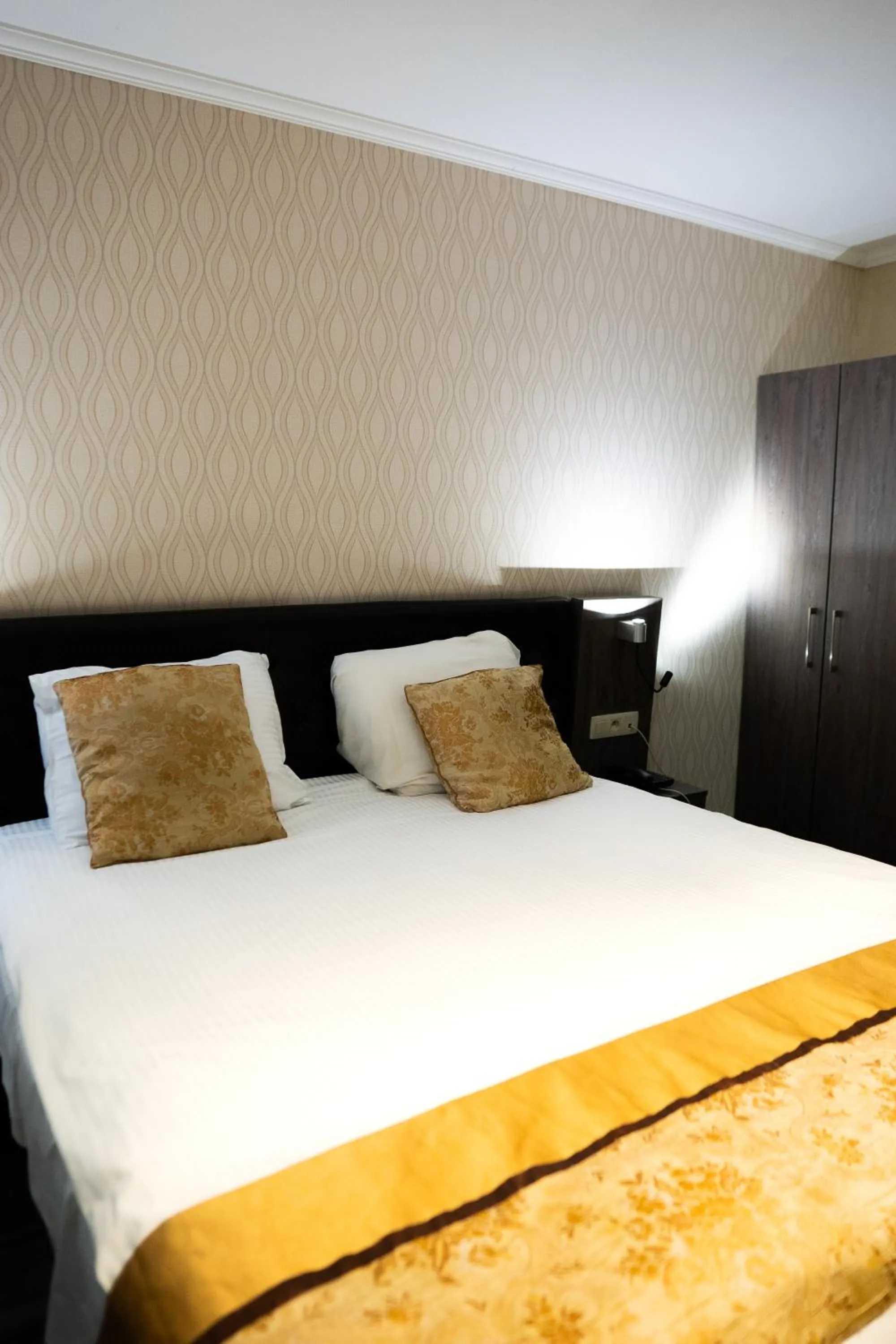 Bed in The Helmet Hotel