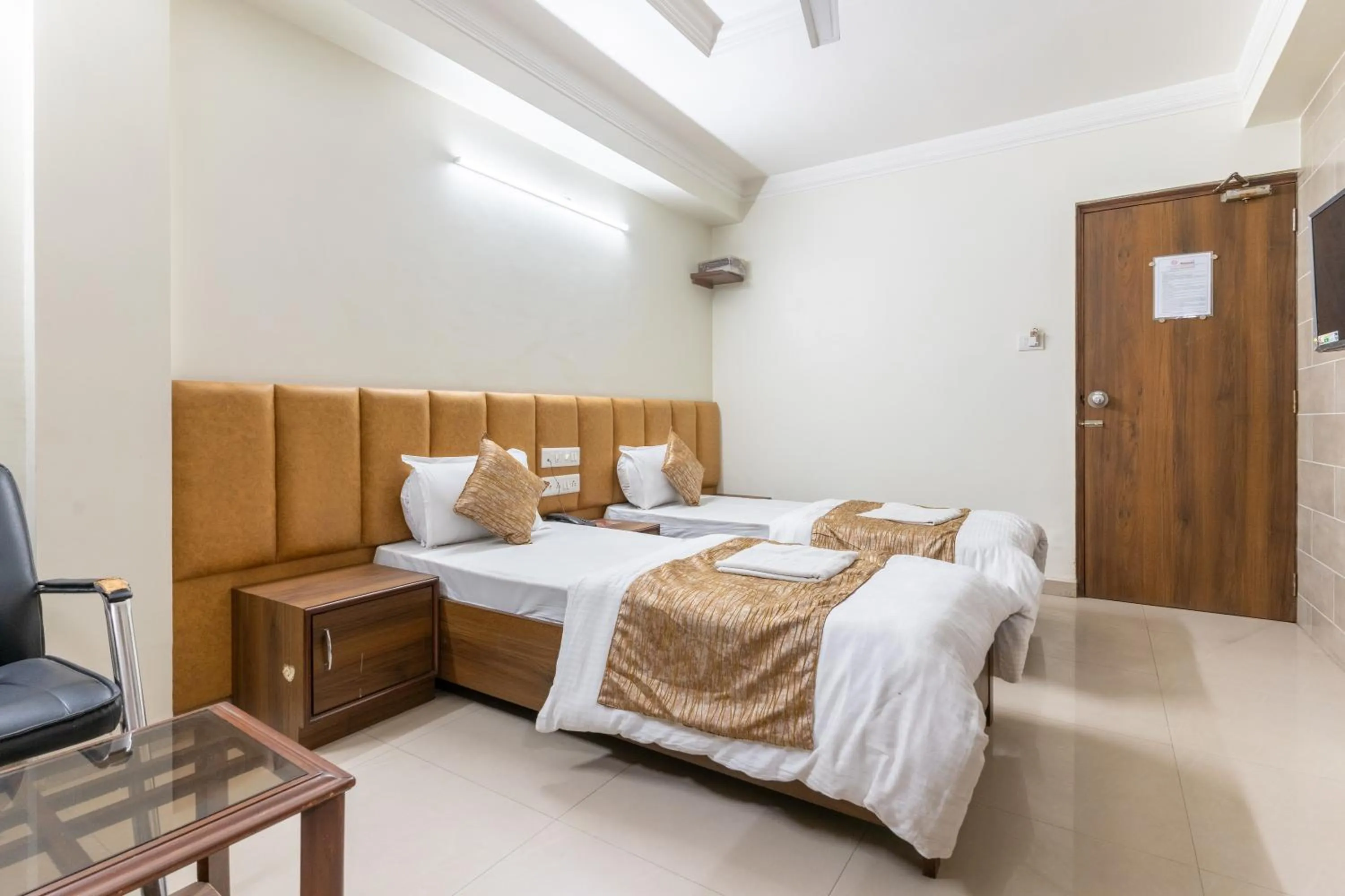 Bed in Hotel Sanmati