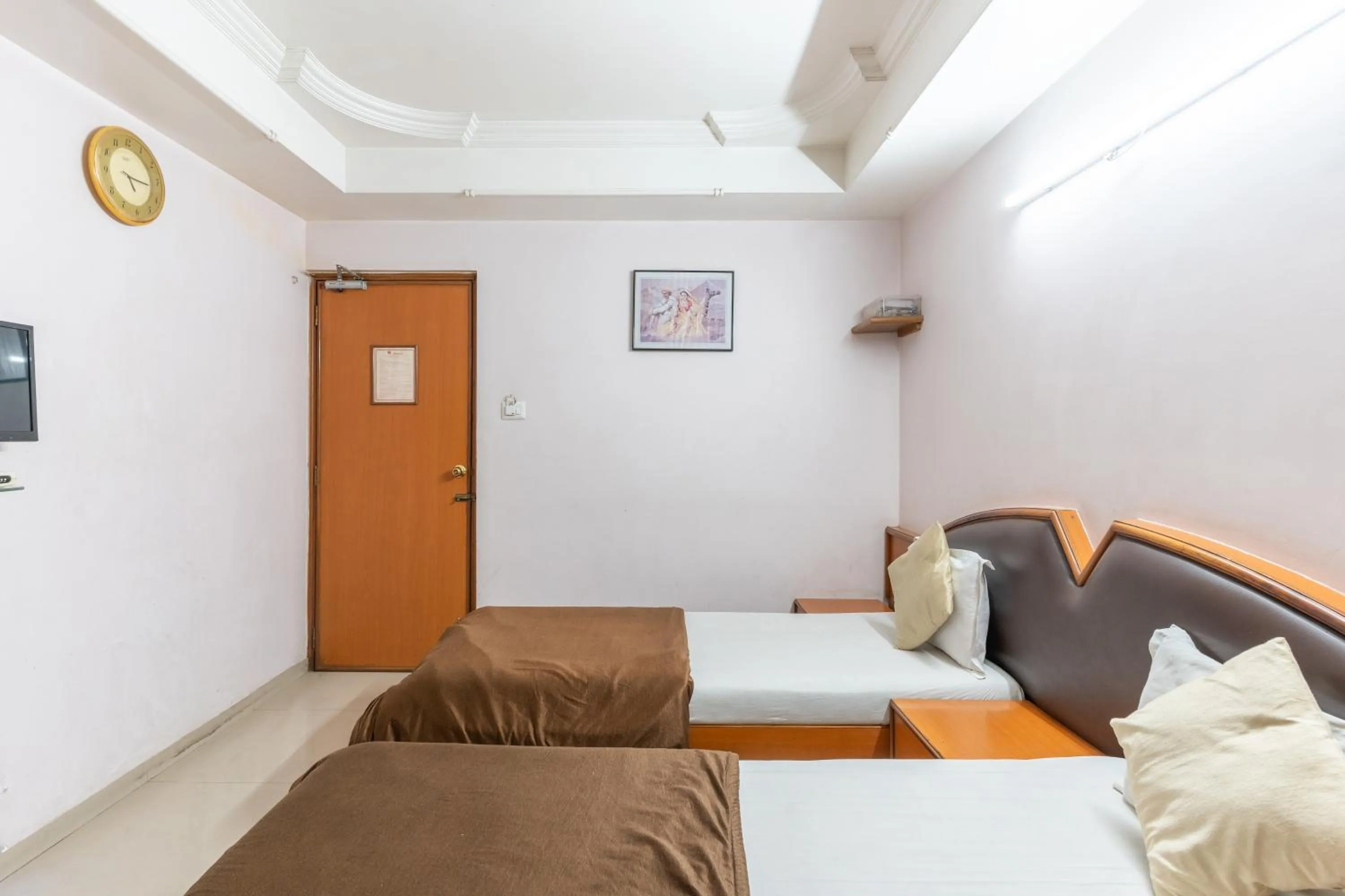 Bed in Hotel Sanmati