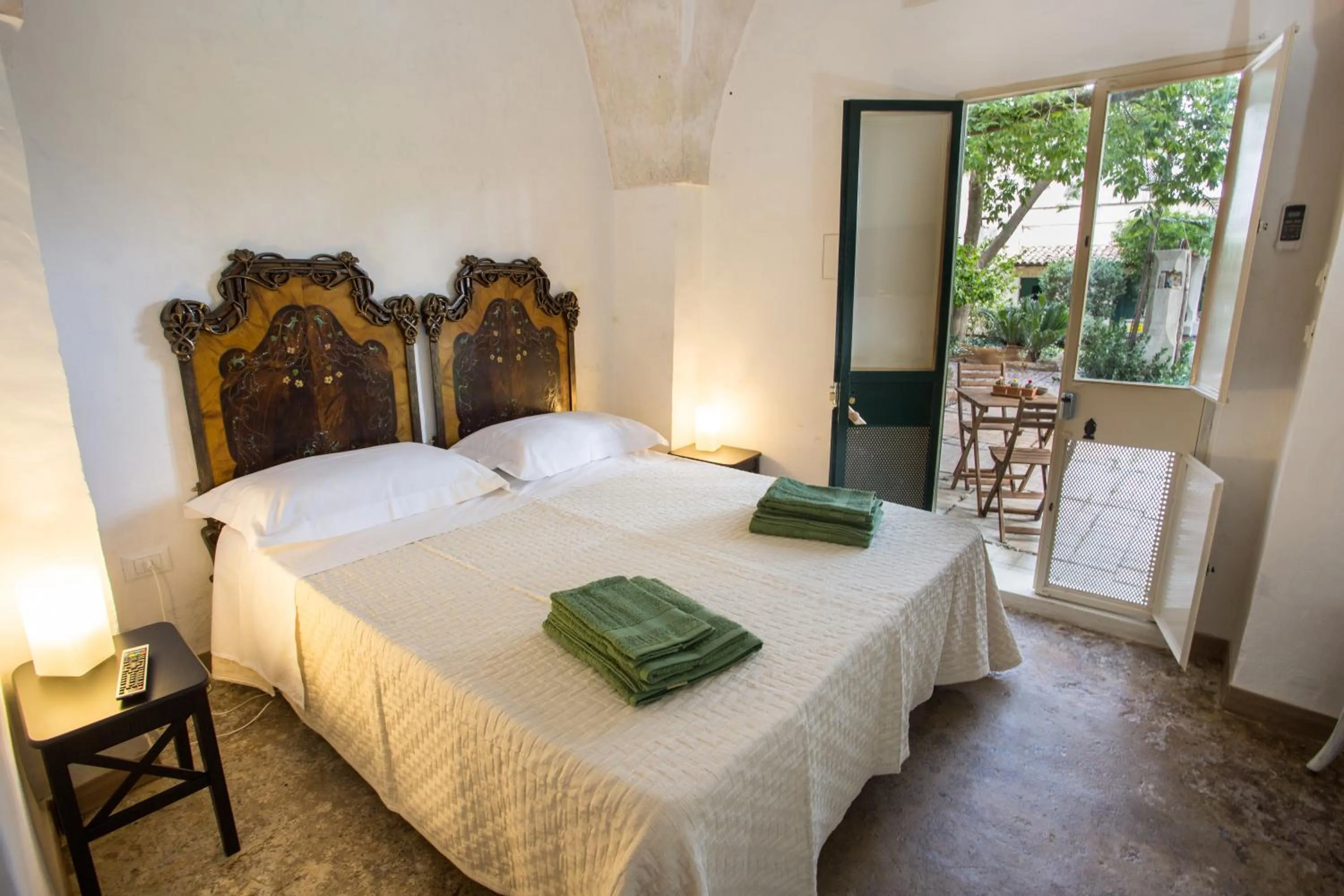 Photo of the whole room, Bed in Giardino Nascosto