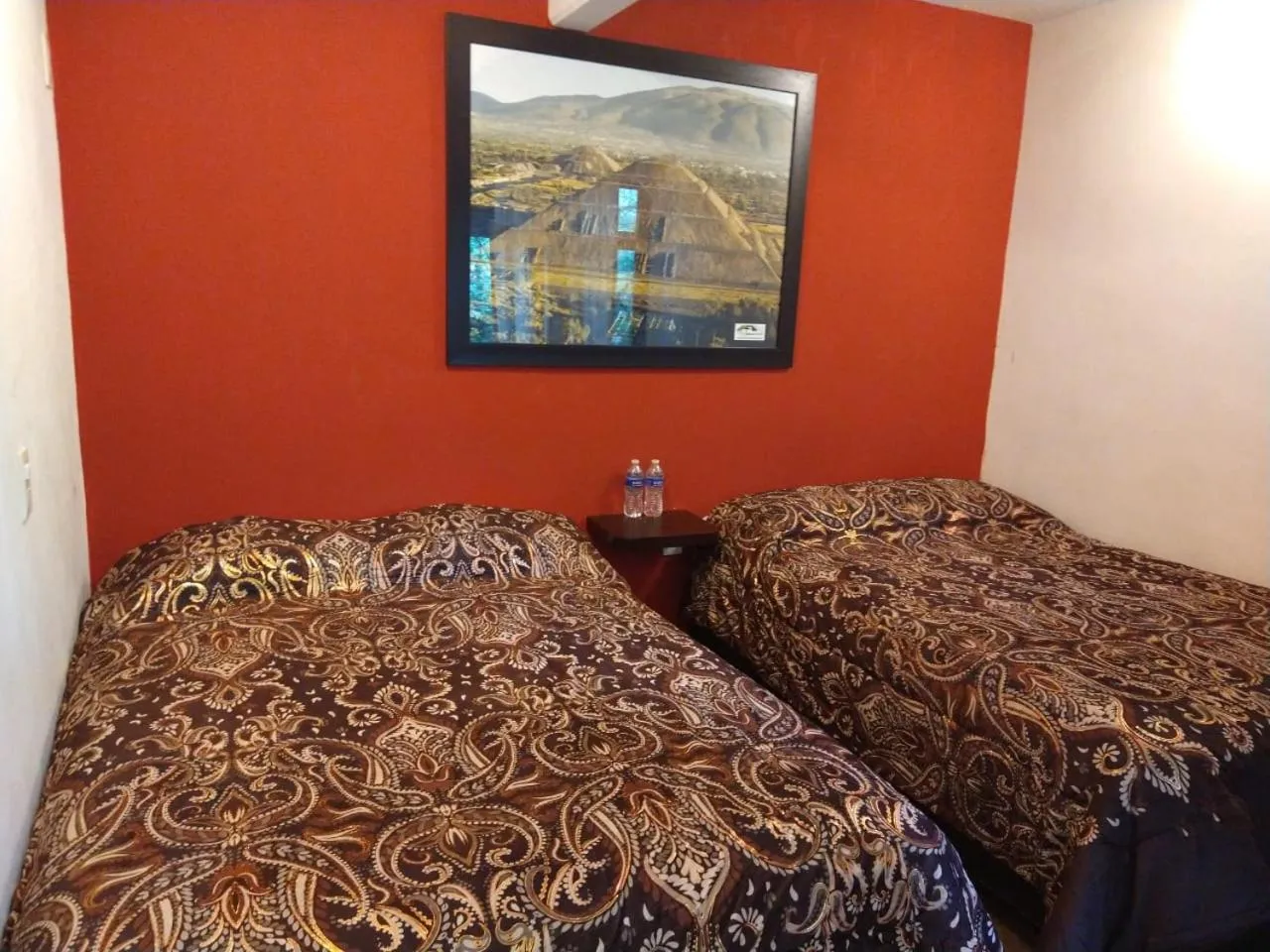 Bed in Telpochcalli Hotel & Temazcal