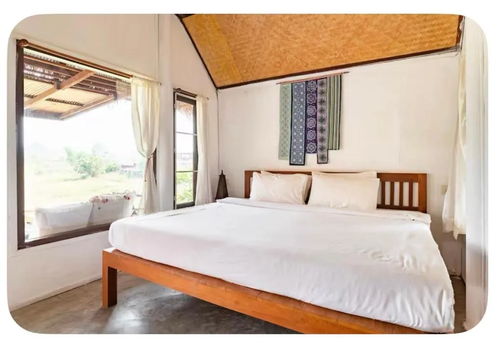 Bed in Bulun Buri Pai Resort