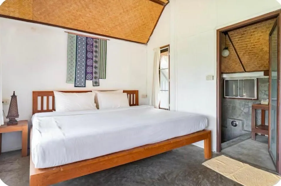 Bed in Bulun Buri Pai Resort