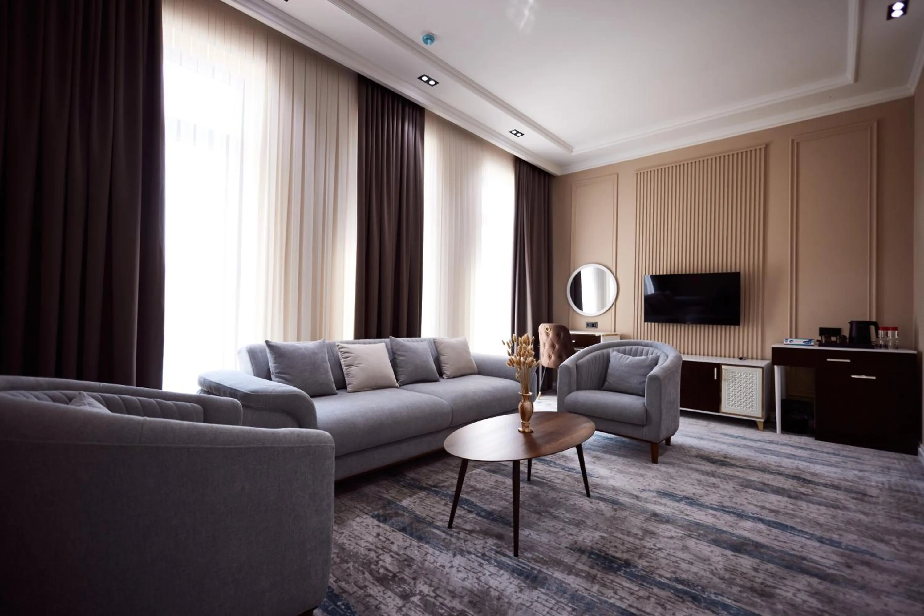 Communal lounge/ TV room in Noble Samarkand