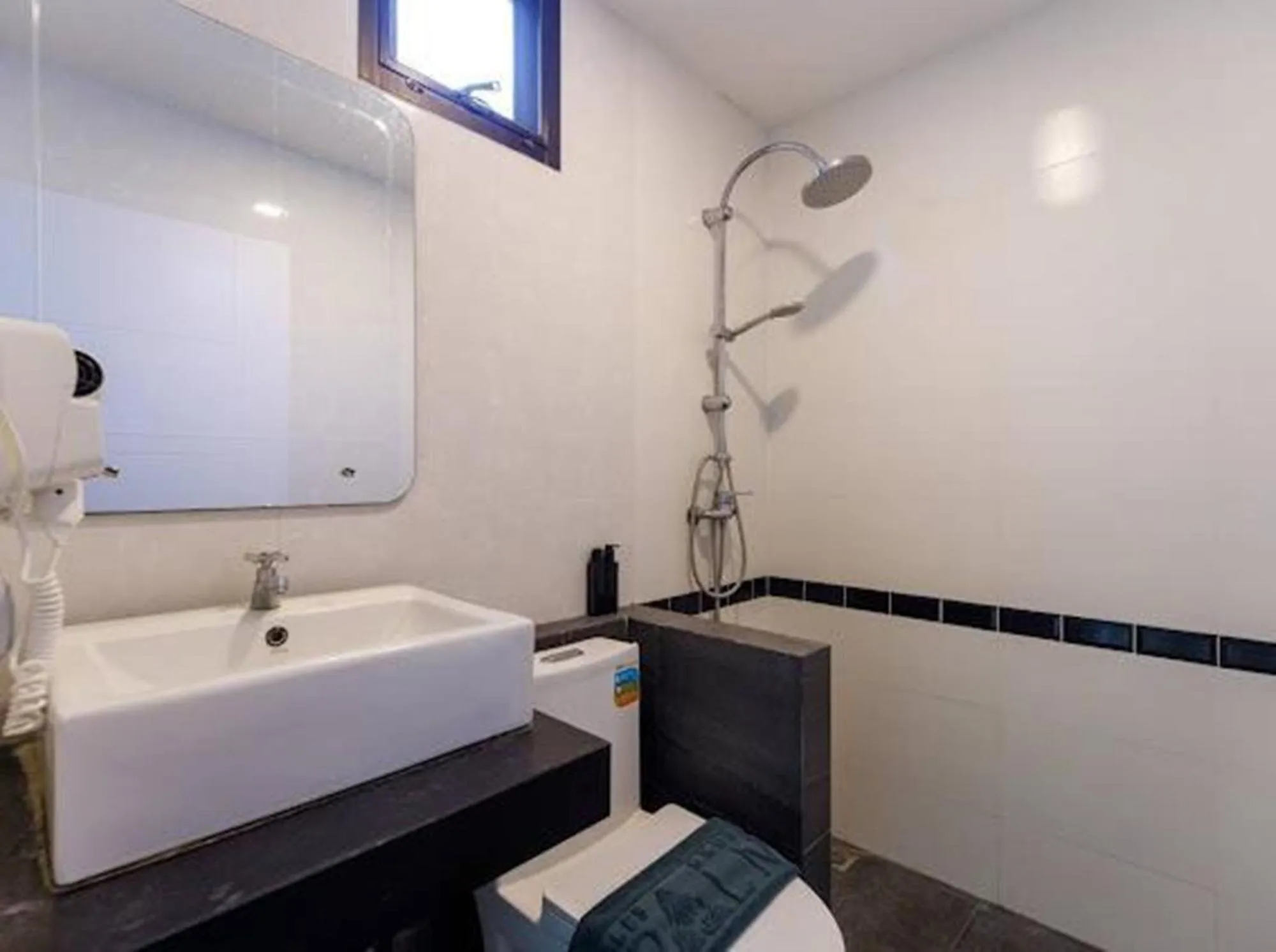 Toilet in The COZY NATURE pool villas phuket