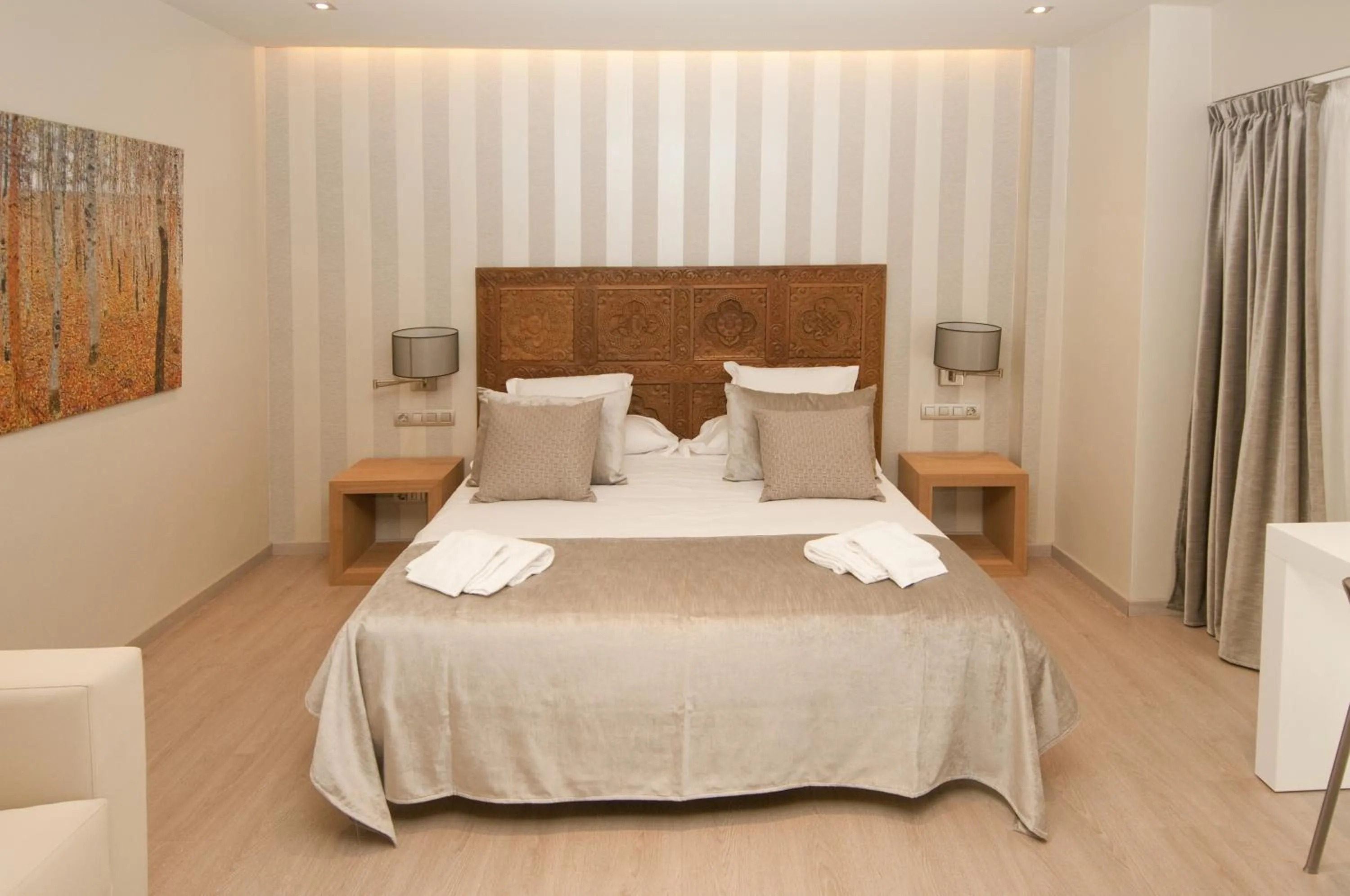 Bed in Serennia Exclusive Rooms