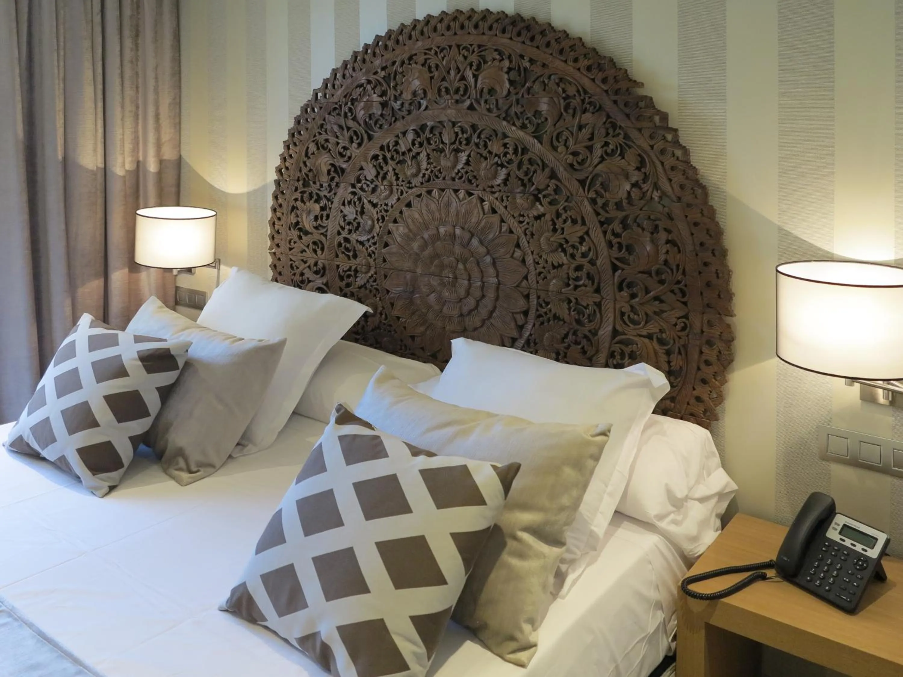 Bed in Serennia Exclusive Rooms