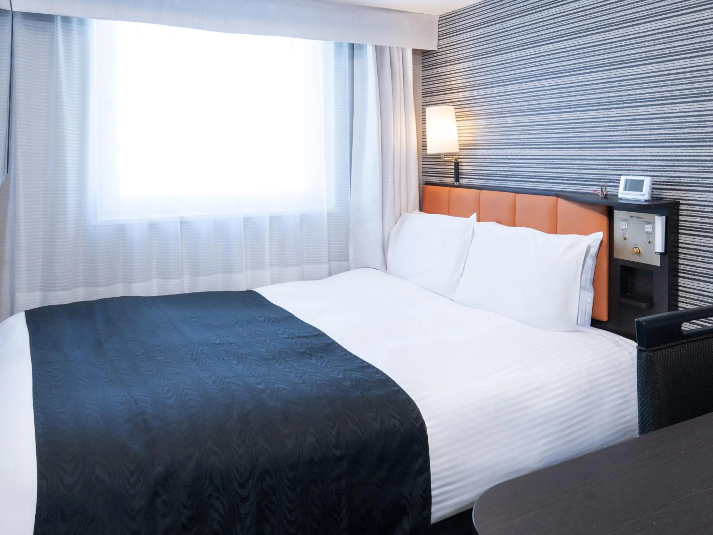 Bed in APA Hotel Shinjuku Kabukicho Tower