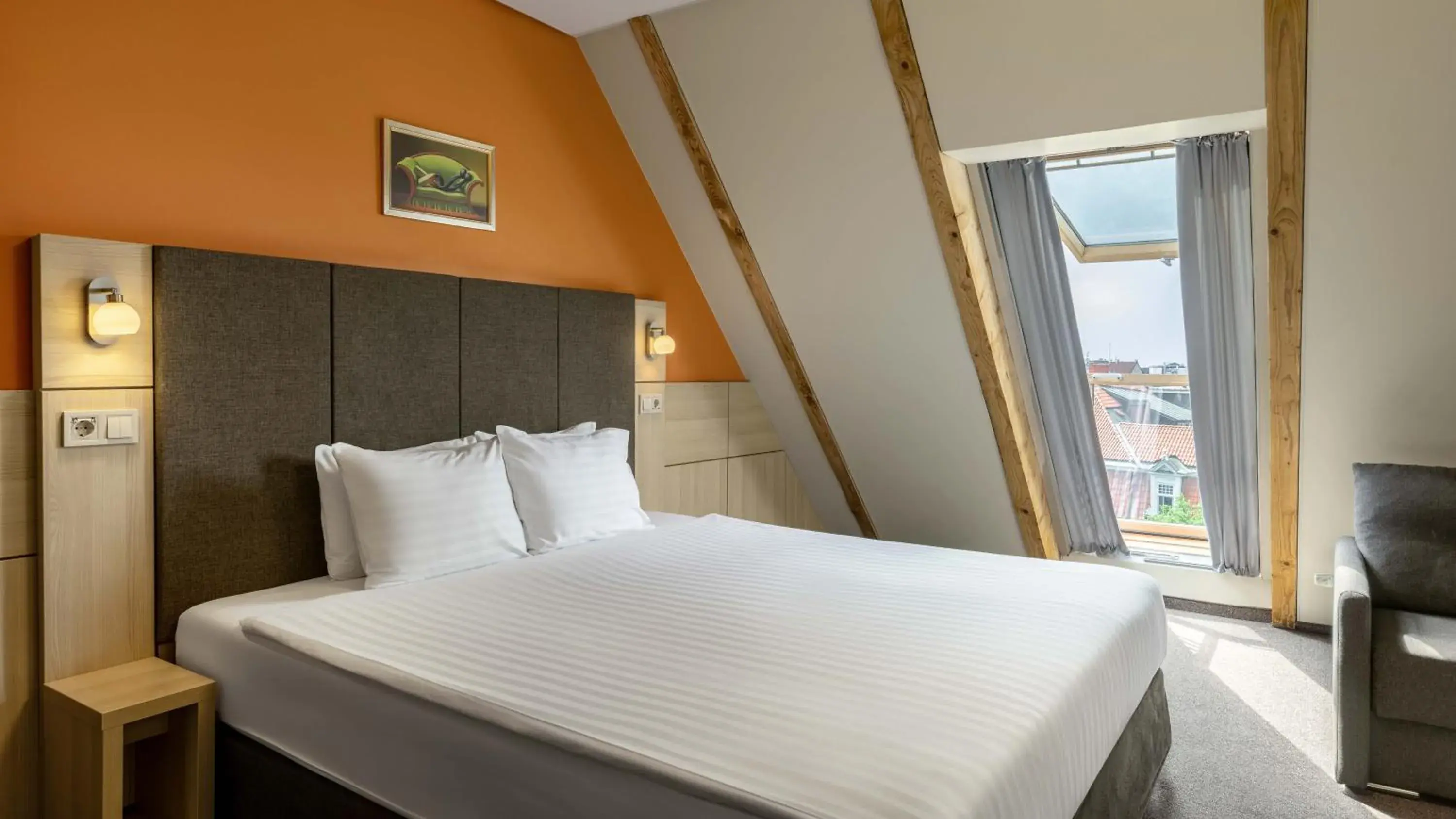 Mansard Double or Twin Room with City View in Wellton Riga Hotel & SPA Mansard Double or Twin Room with City View in Wellton Riga Hotel & SPA