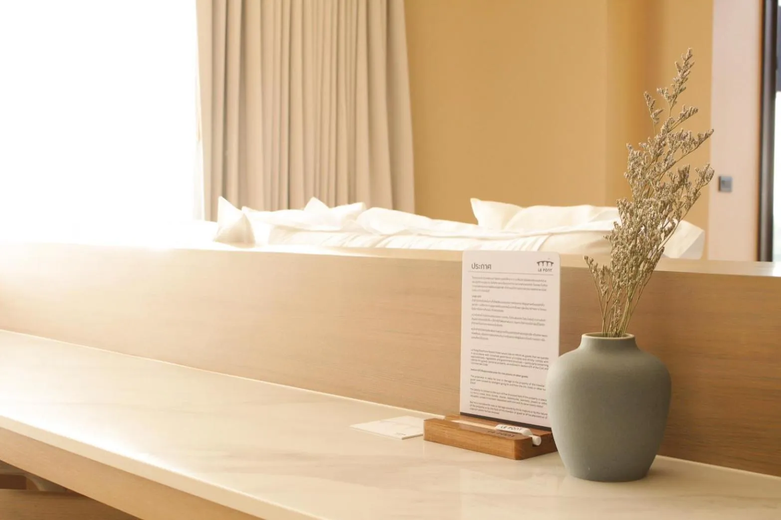 Bed in LePont Riverfront Resort Nongkhai