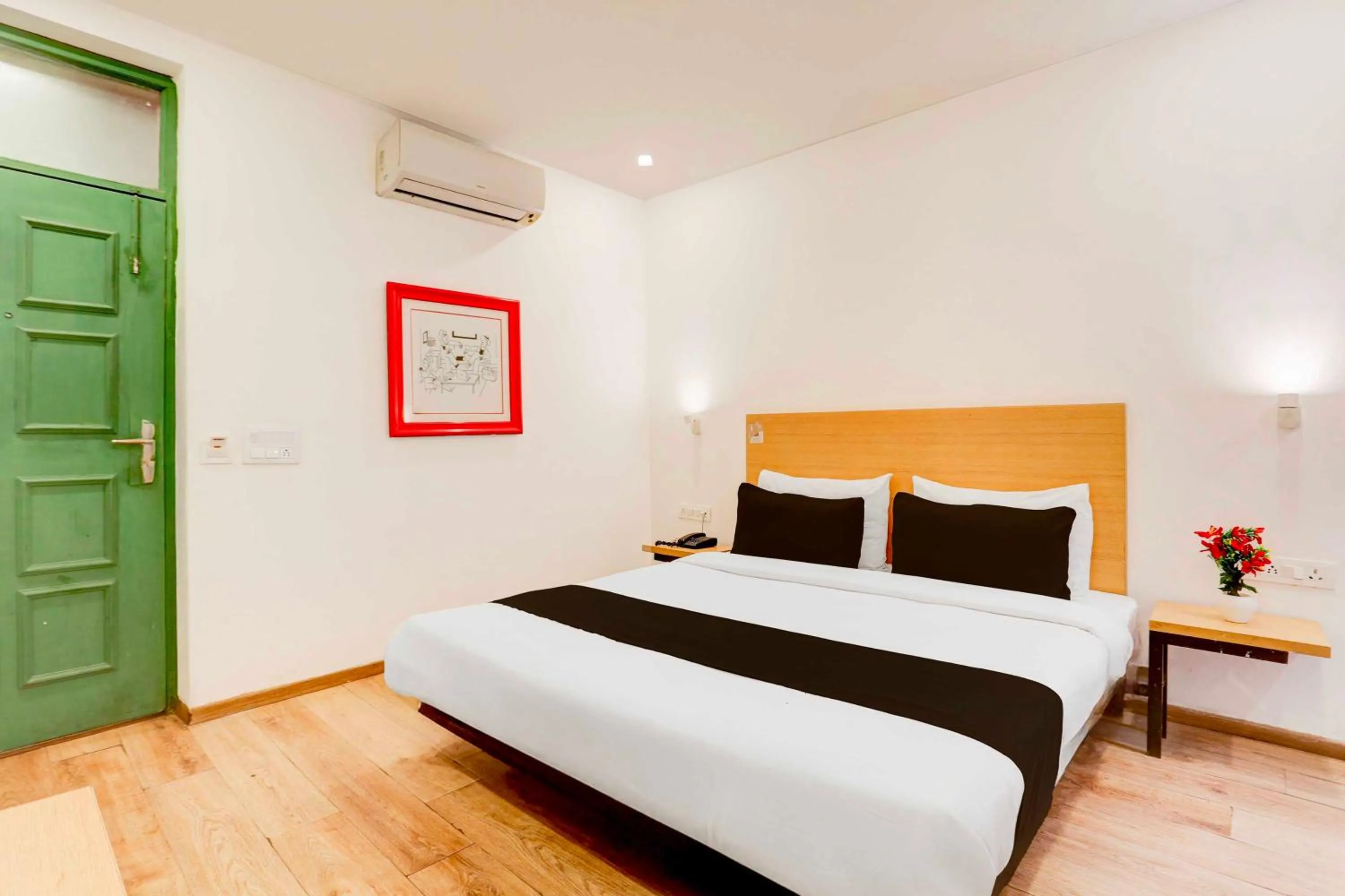Classic Triple Room - single occupancy in Collection O Sector 64 Near WorldMark Gurugram