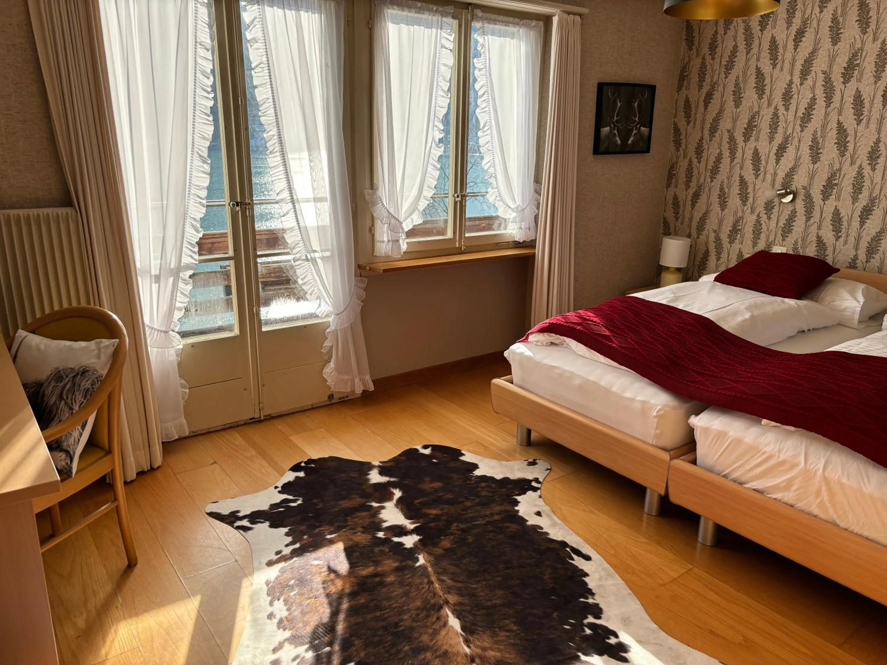Bed in Alpina Boutique Hotel Interlaken - Ringgenberg - Adults only !