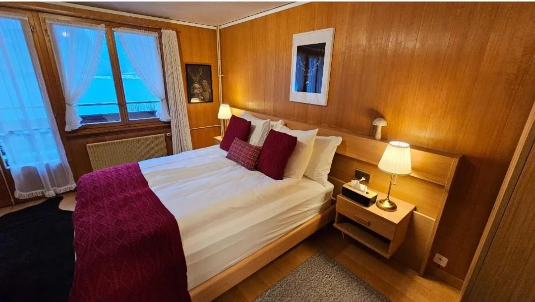 Bedroom, Bed in Alpina Boutique Hotel Interlaken - Ringgenberg - Adults only !