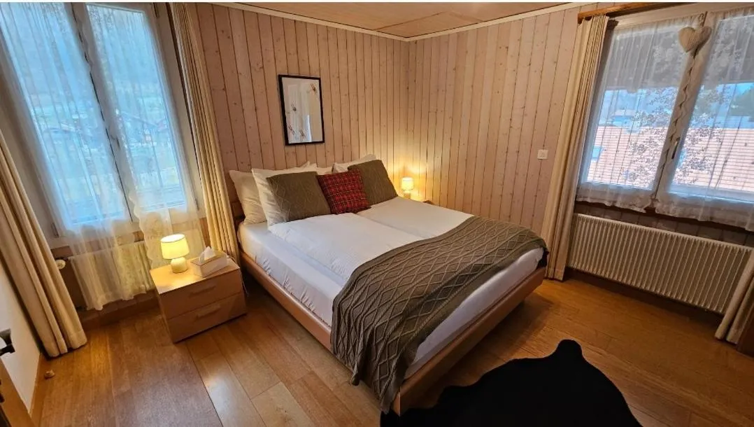 Bedroom, Bed in Alpina Boutique Hotel Interlaken - Ringgenberg - Adults only !