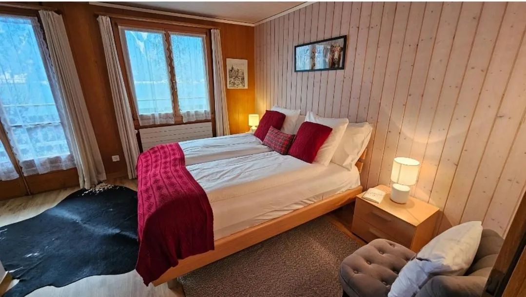 Bedroom, Bed in Alpina Boutique Hotel Interlaken - Ringgenberg - Adults only !