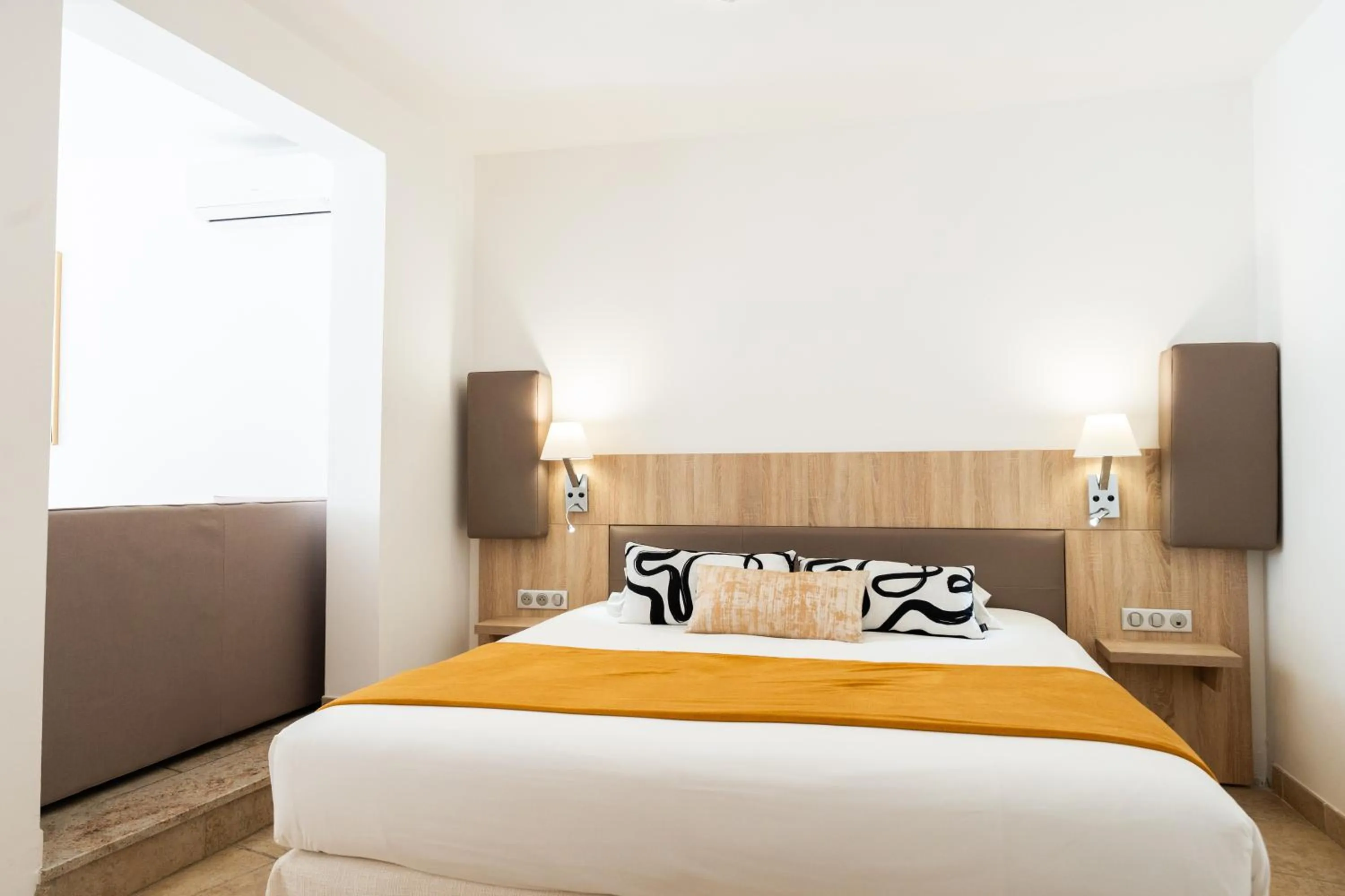 Bed in Hotel Arena le Refuge