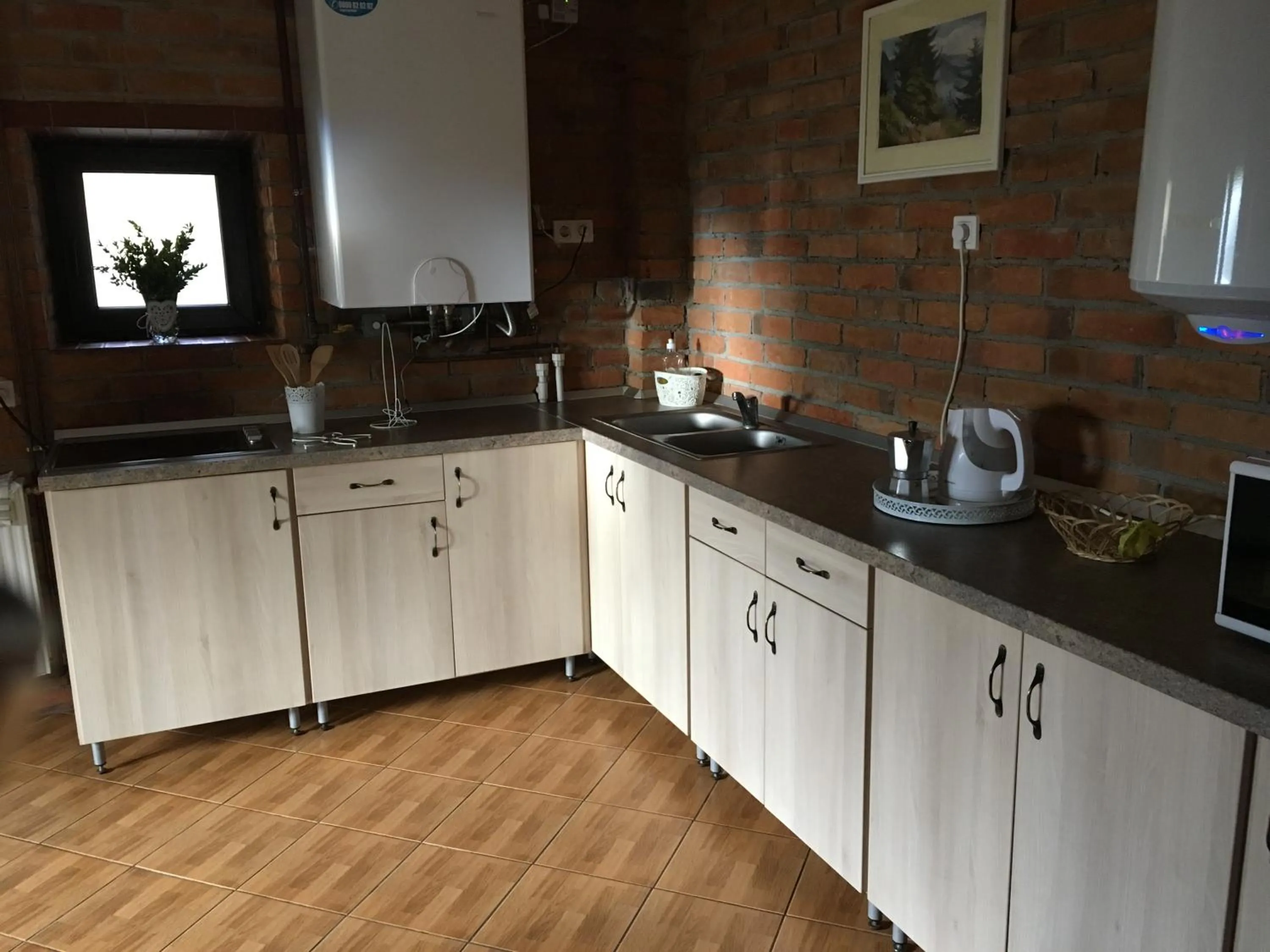 Kitchen or kitchenette in Casa Skandik Ház