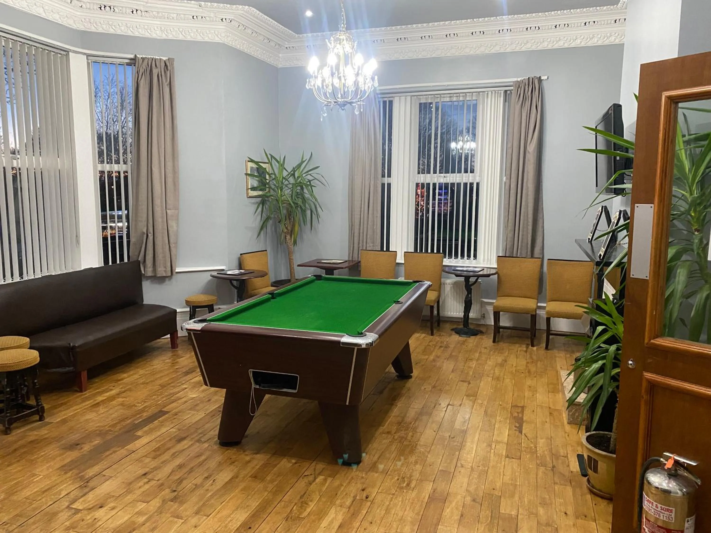 Communal lounge/ TV room in The Clifton Hotel Newcastle