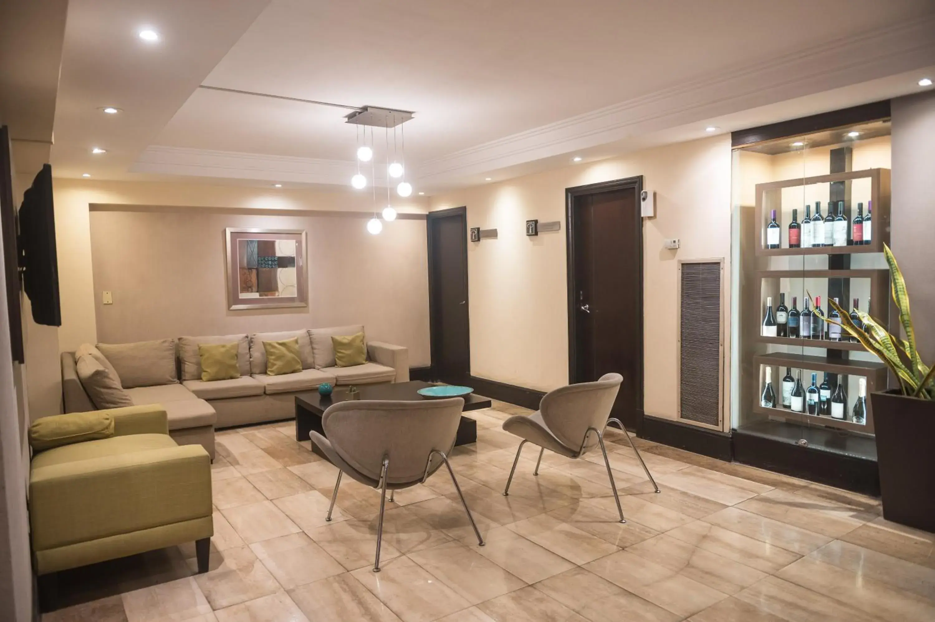 Lobby or reception in Premium Tower Suites Mendoza Lobby or reception in Premium Tower Suites Mendoza
