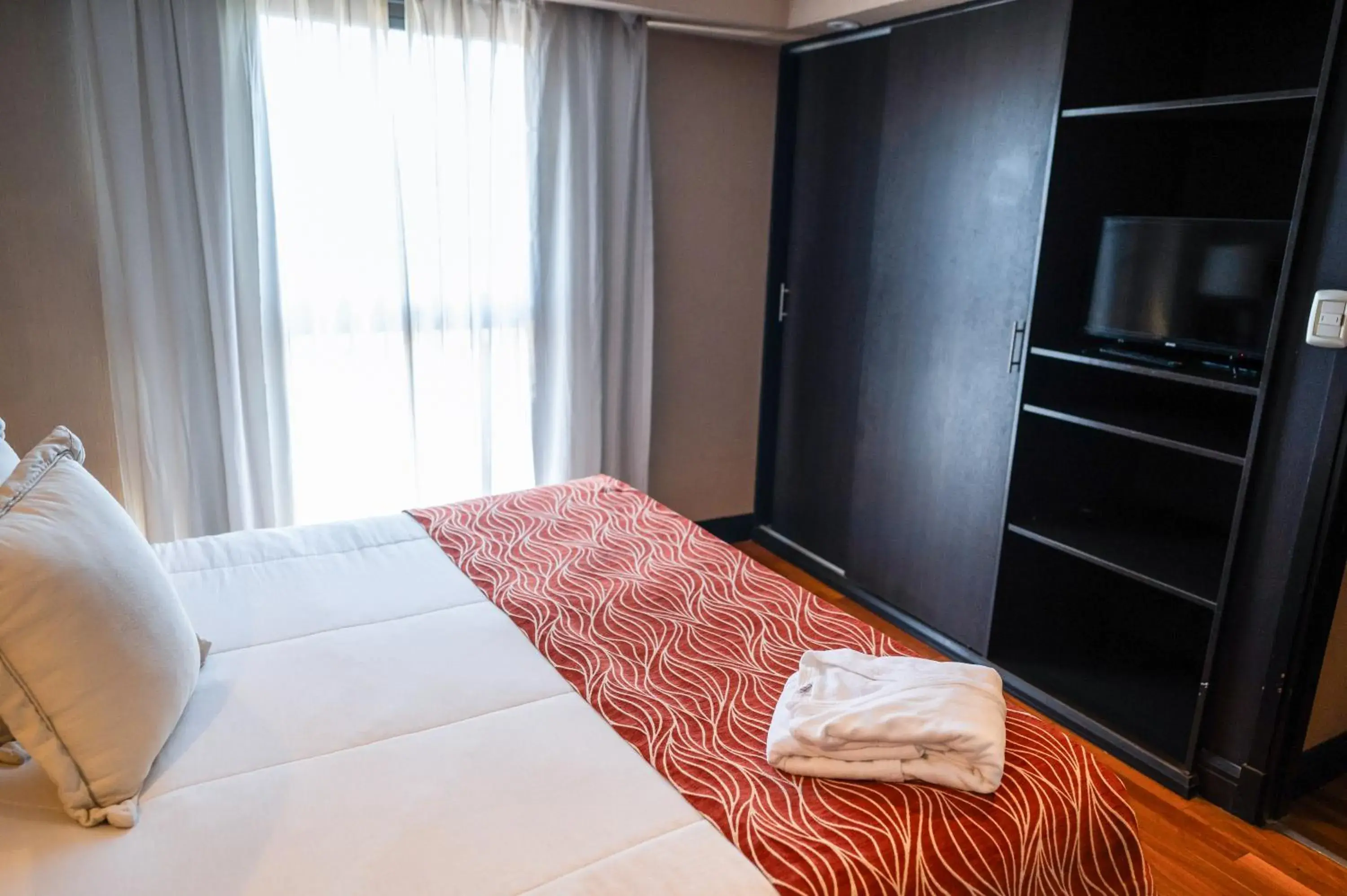 Bed in Premium Tower Suites Mendoza Bed in Premium Tower Suites Mendoza