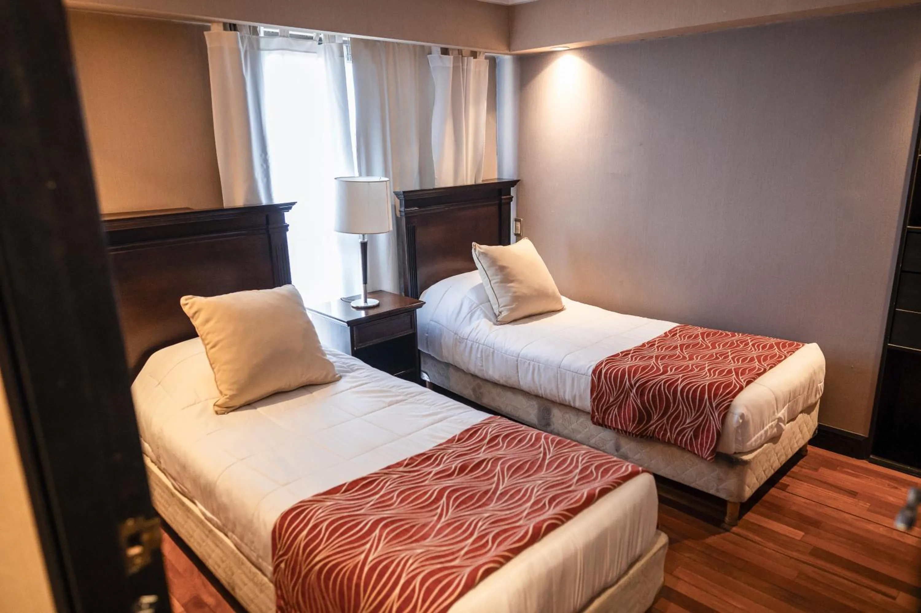 Bed in Premium Tower Suites Mendoza