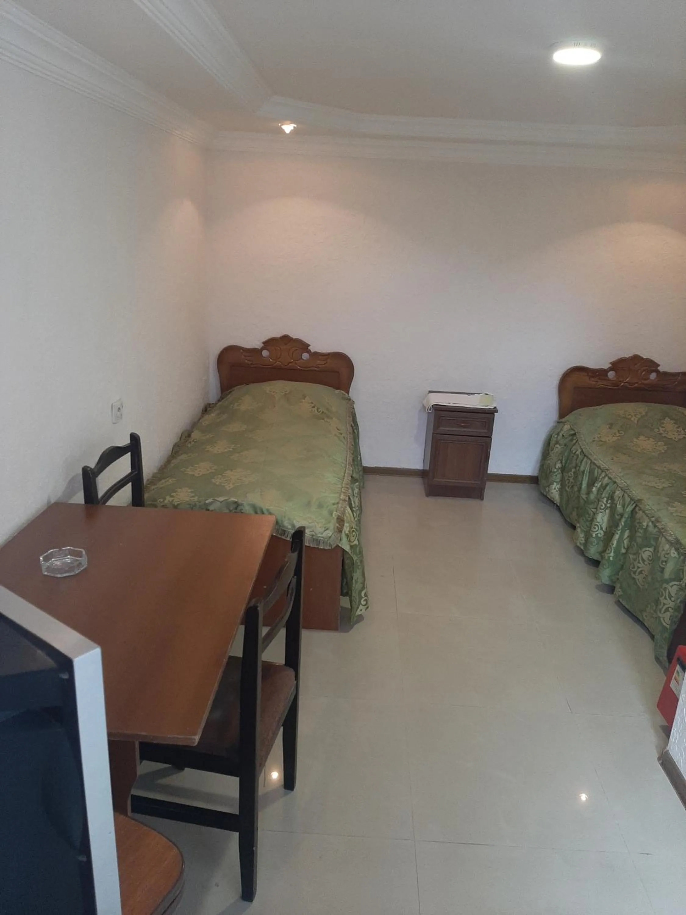 Bed in NarVar Hotel