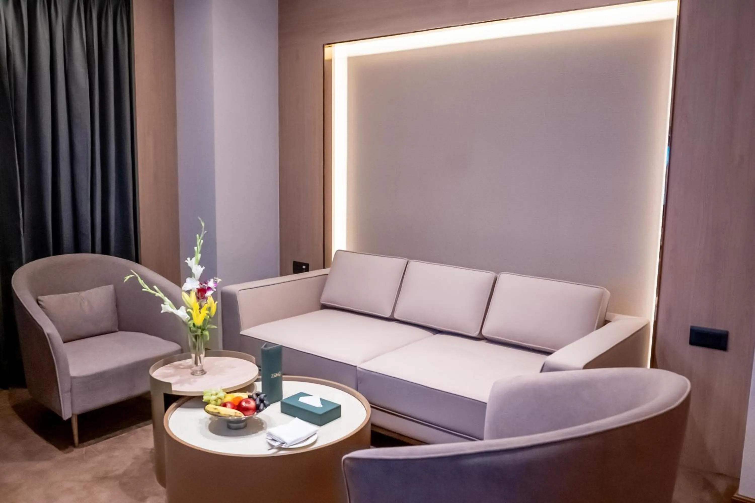 Living room in ASTER GRAND BY ZENQ Saket