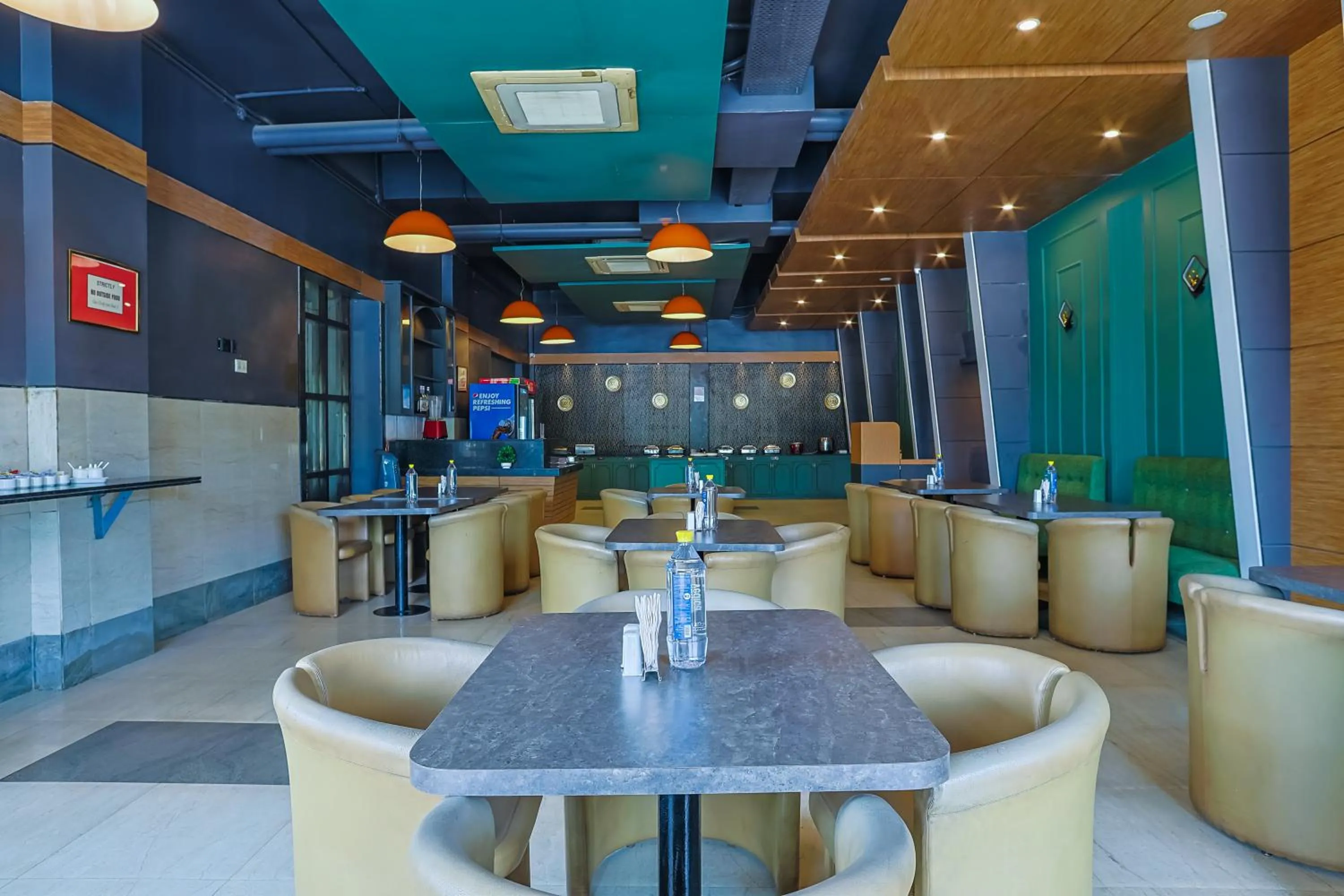 Dining area in Max Hotels Prayagraj