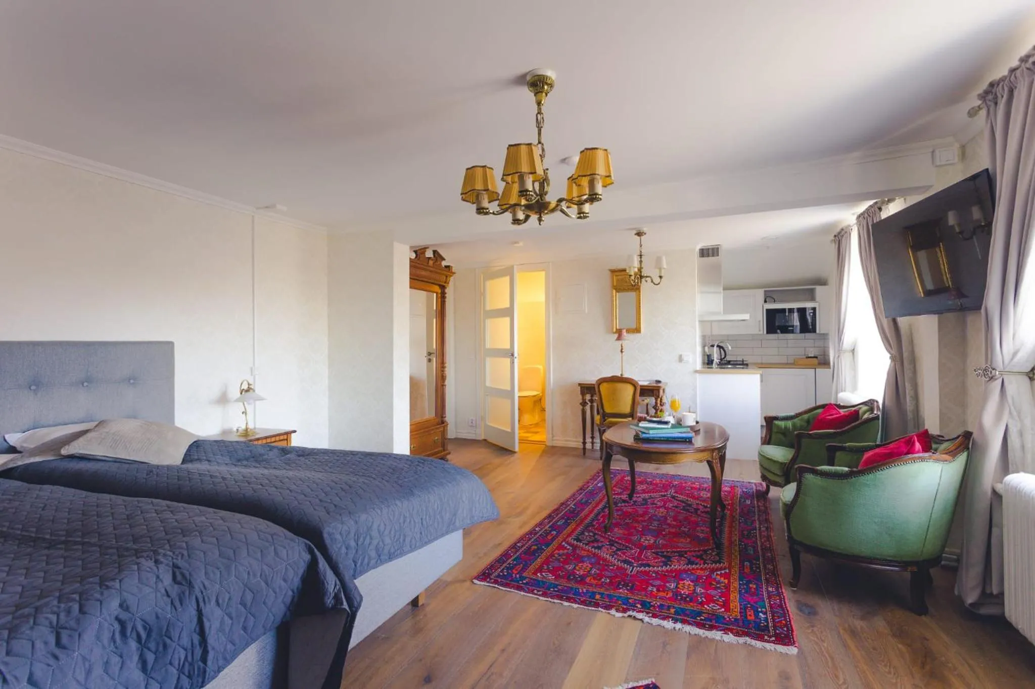 Photo of the whole room, Bed in Laxå Herrgårdshotellet