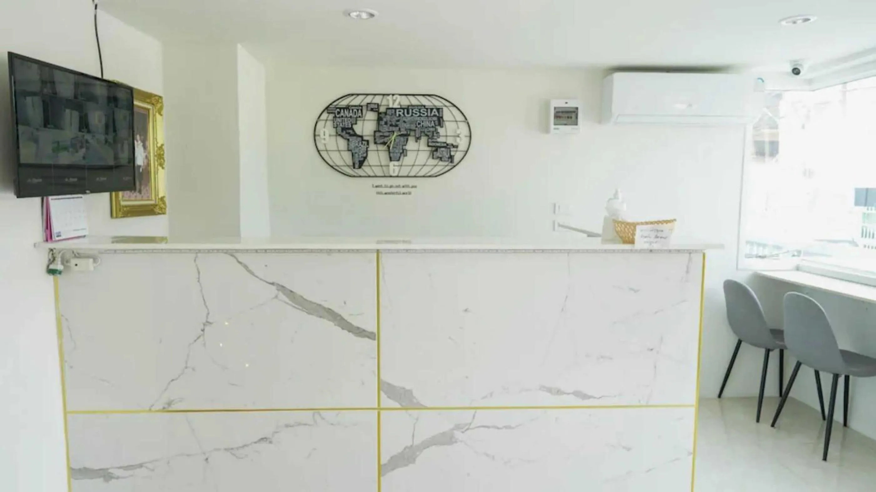 Lobby or reception in RQ Suvarnabhumi Airport by Collection O