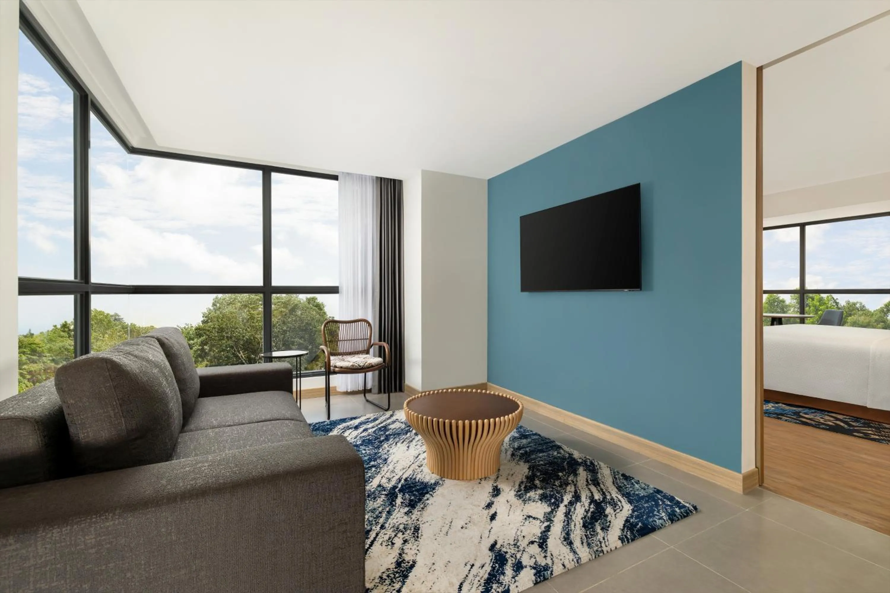 Living room, Bed in Four Points by Sheraton Pontianak