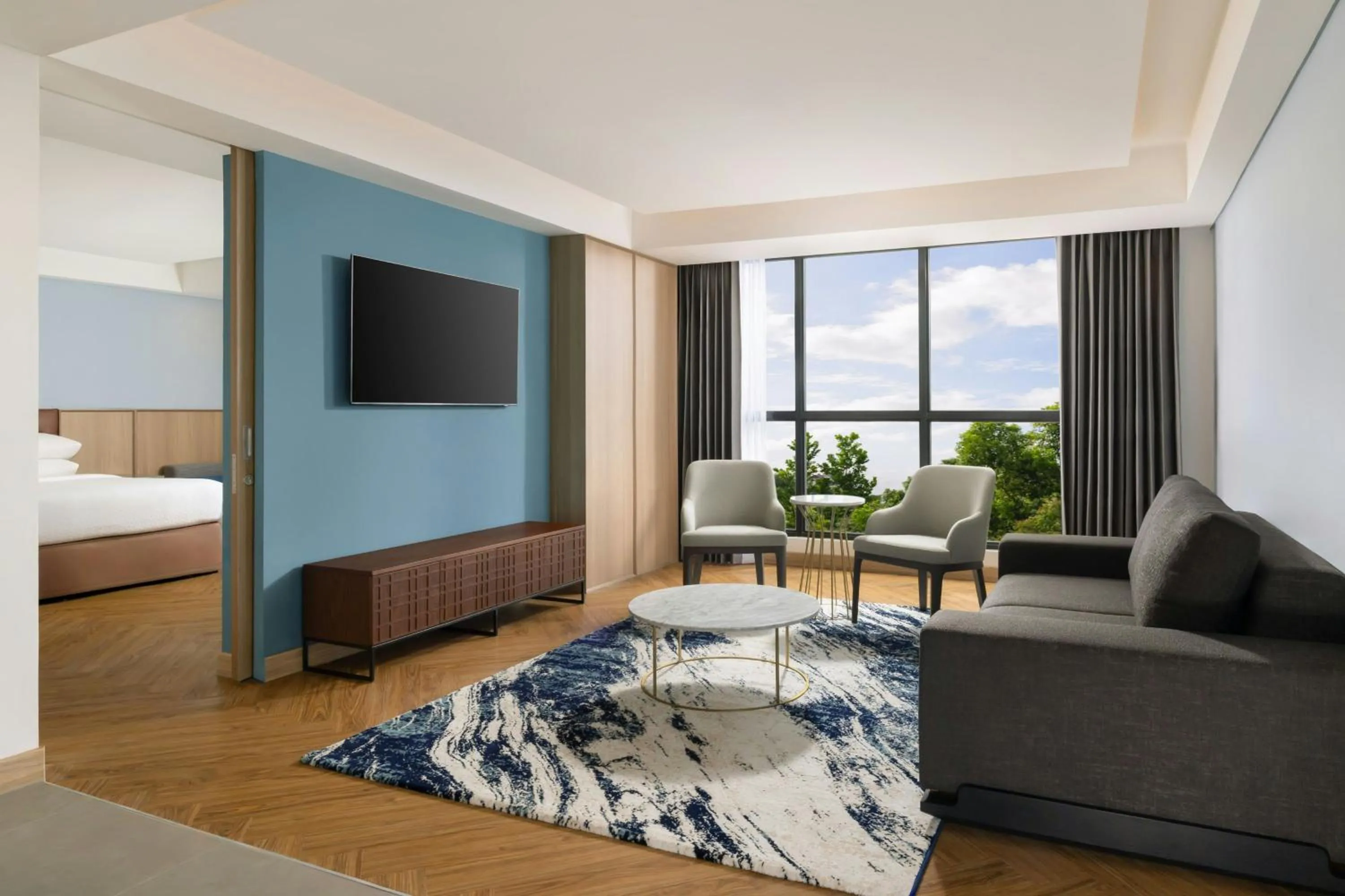 Living room, Bed in Four Points by Sheraton Pontianak