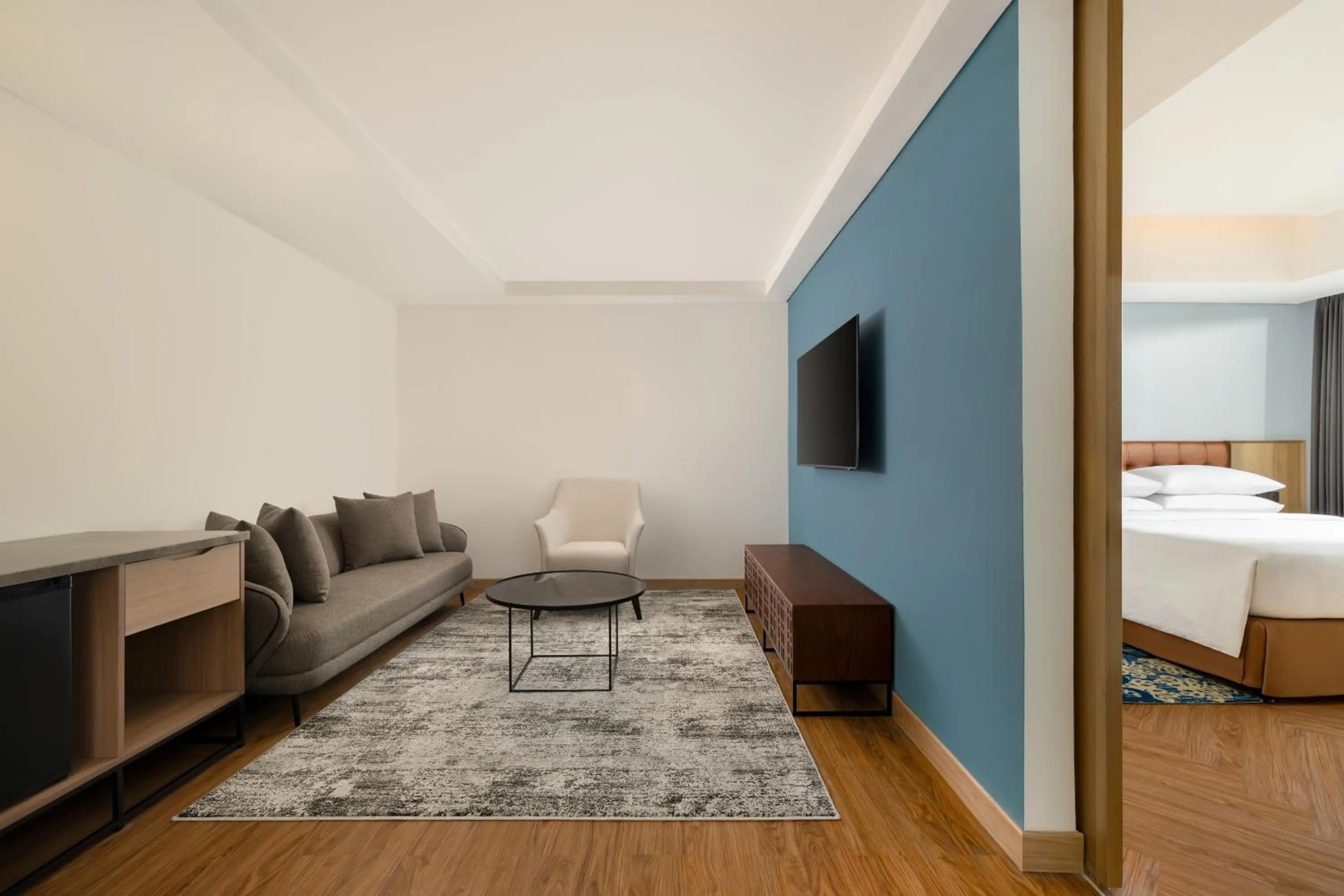 Living room, Bed in Four Points by Sheraton Pontianak