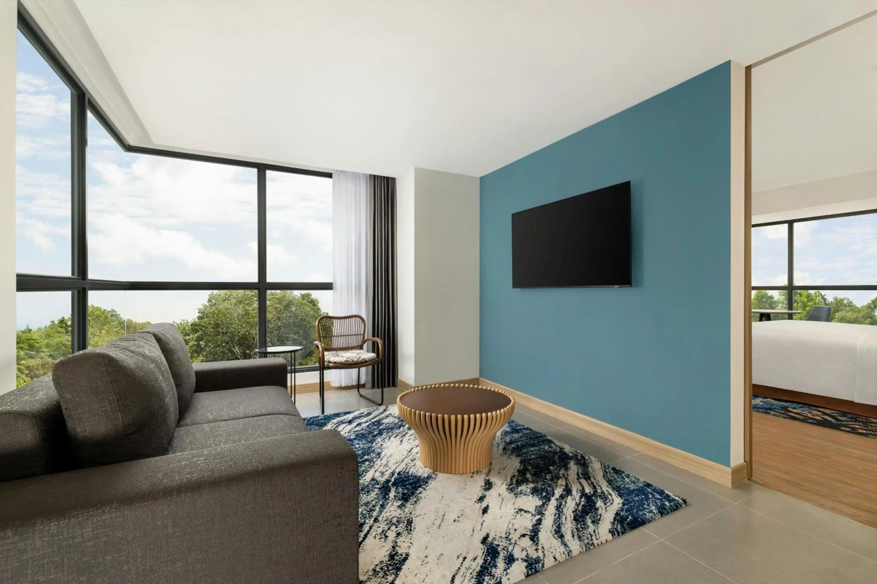 Living room, Bed in Four Points by Sheraton Pontianak