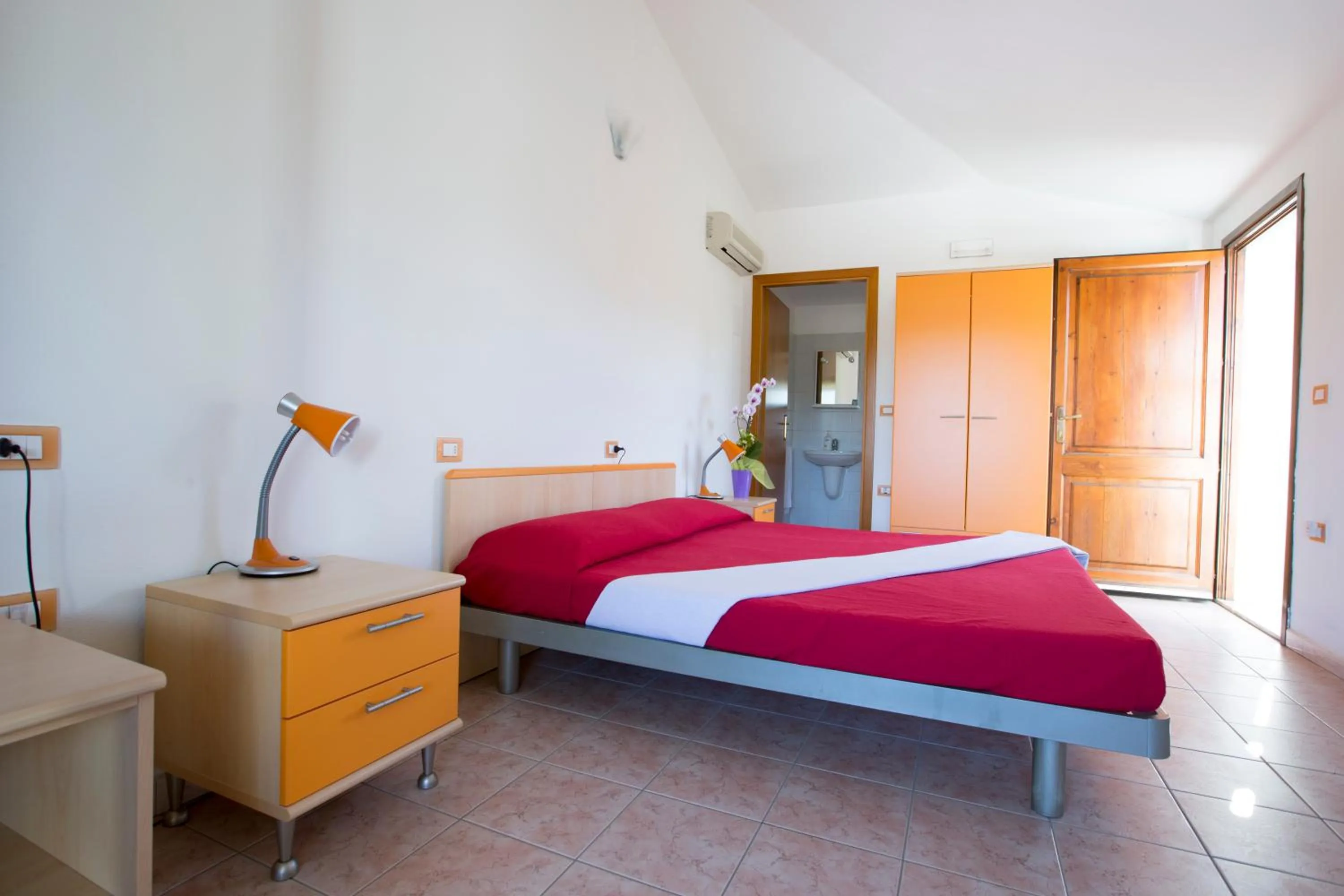 Photo of the whole room, Bed in La Corte Degli Ulivi