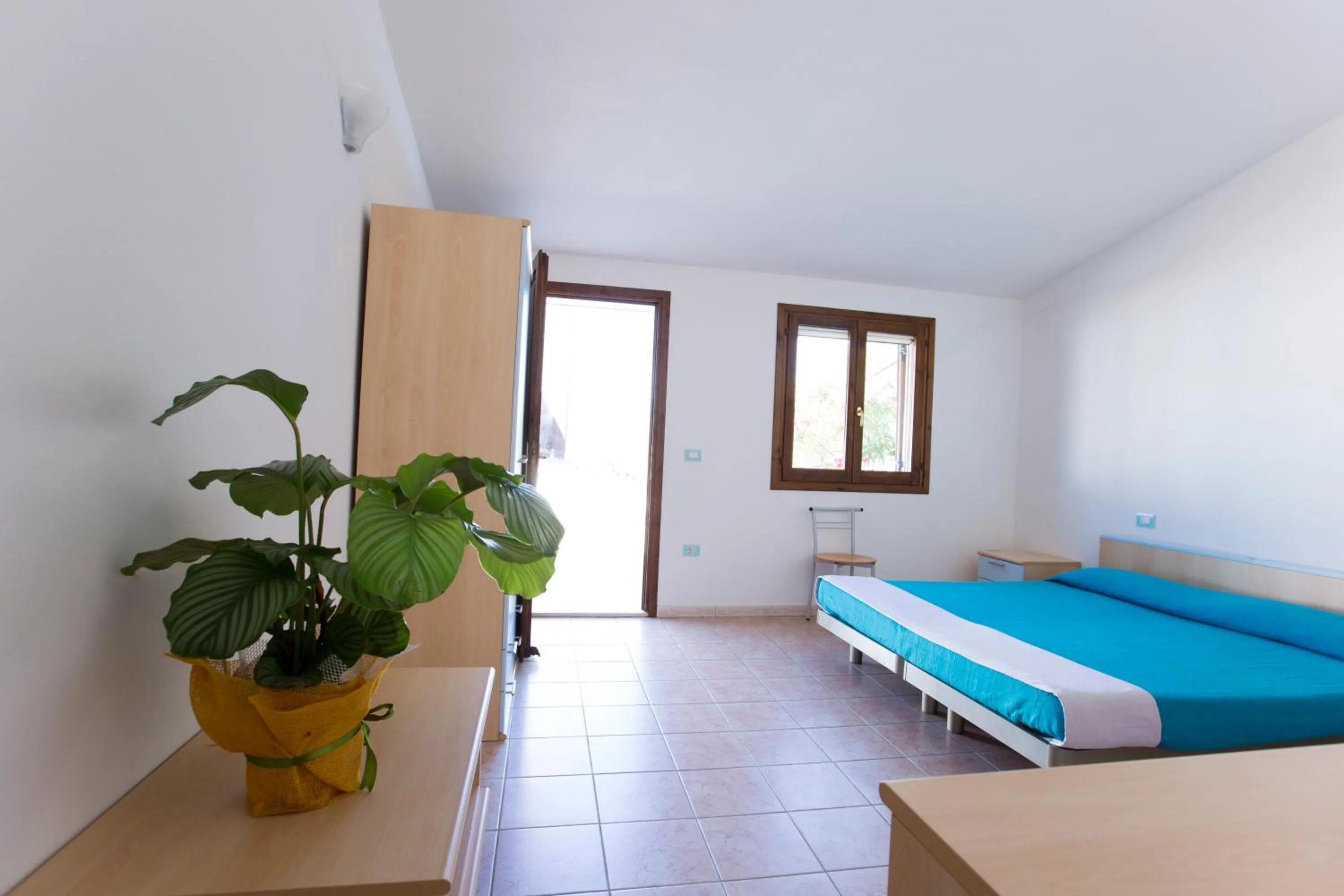 Photo of the whole room, Bed in La Corte Degli Ulivi