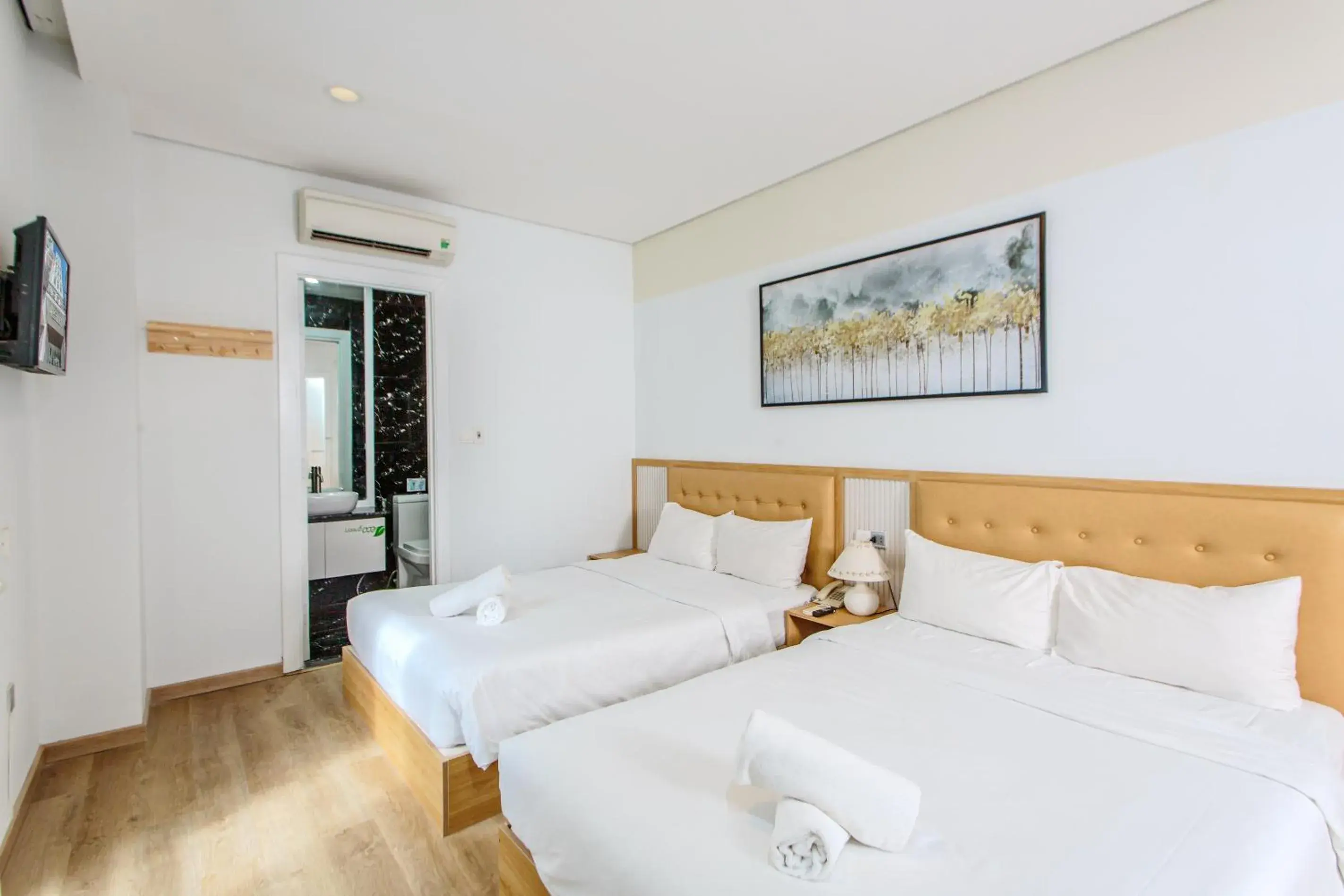 Deluxe Double Room with Two Double Beds in Palmier Hotel - Art House Da Nang Deluxe Double Room with Two Double Beds in Palmier Hotel - Art House Da Nang