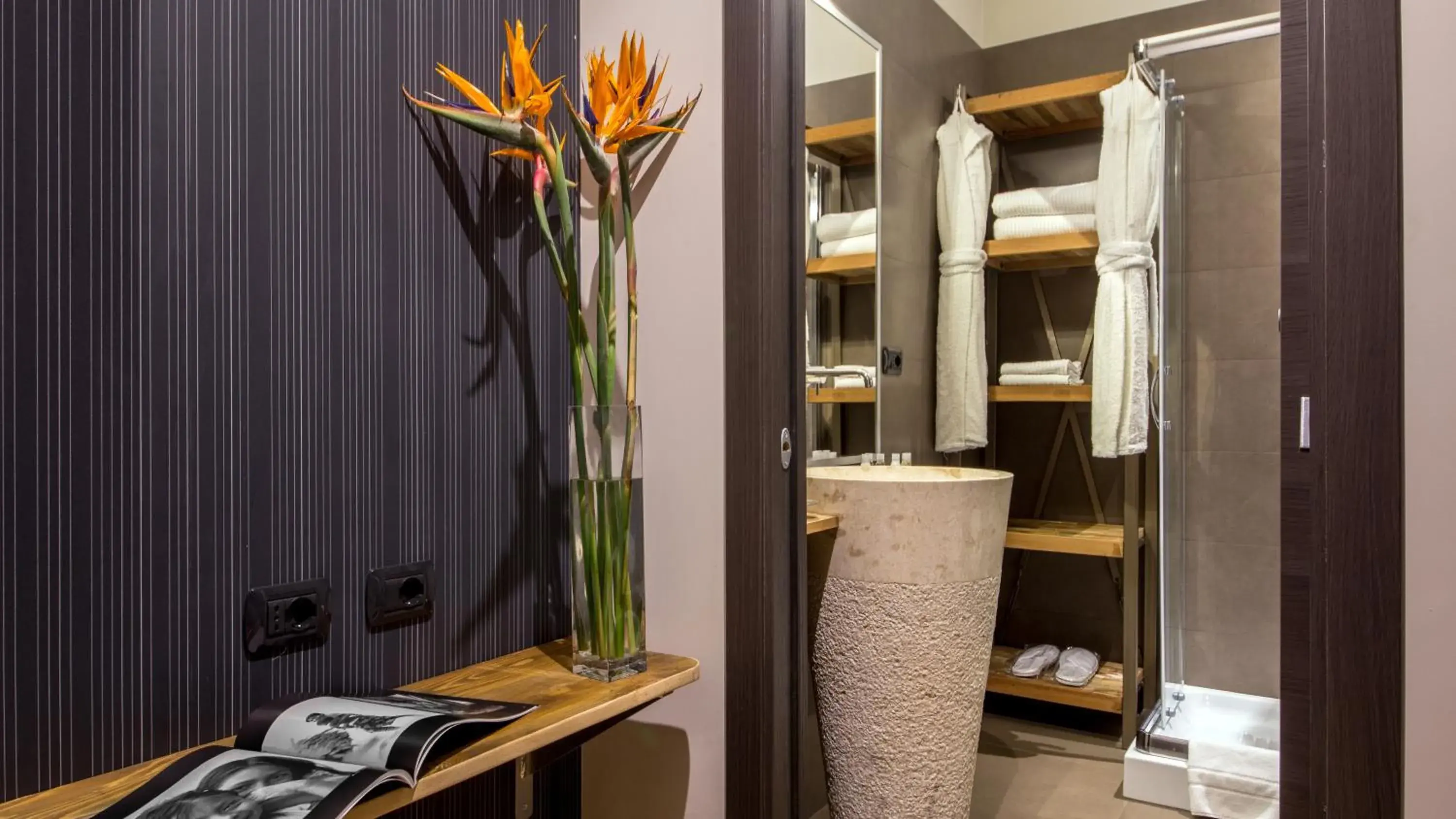 Living room in QT Suites Roma Living room in QT Suites Roma