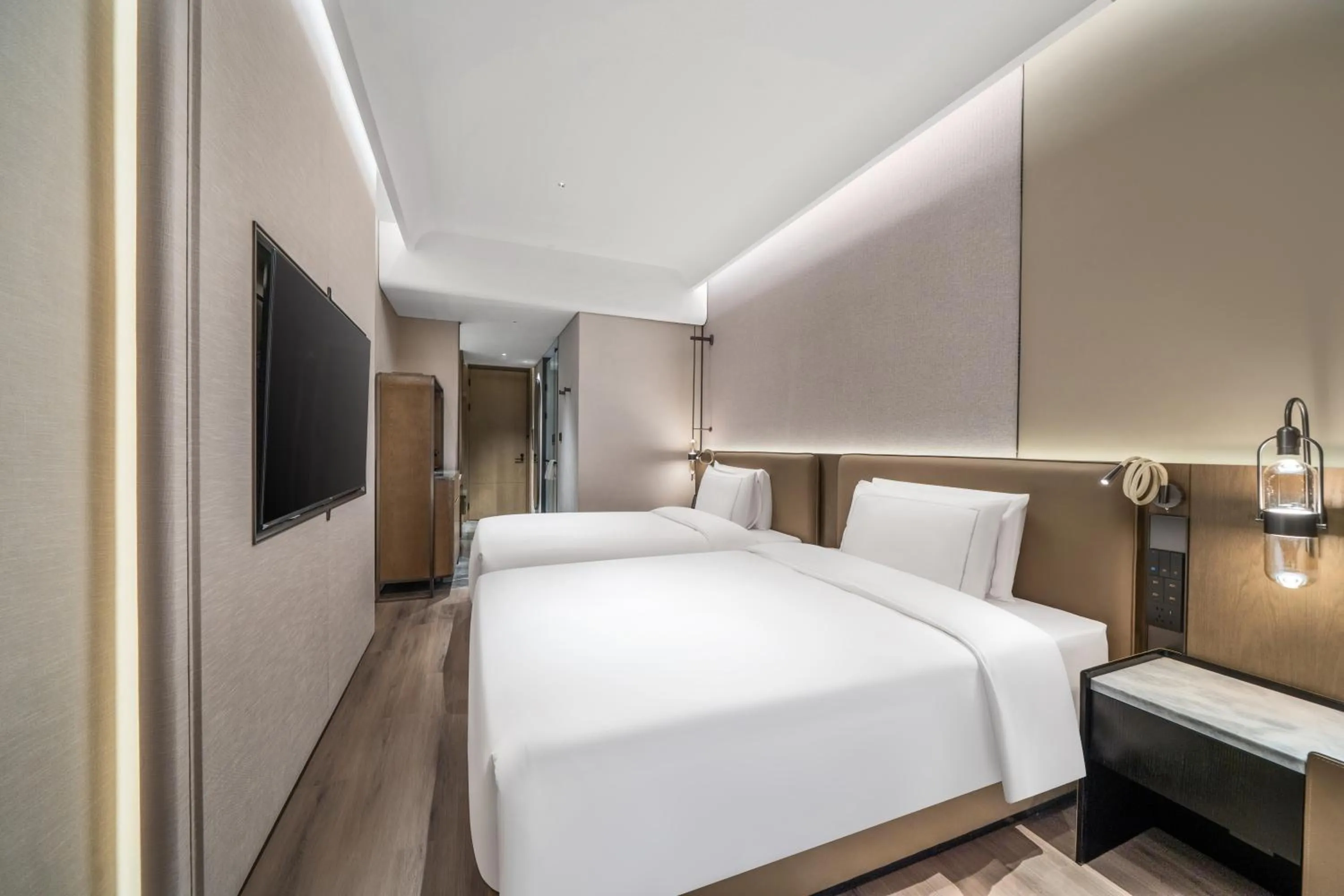 Bed in UrCove by Hyatt Shenzhen Bay Mixc