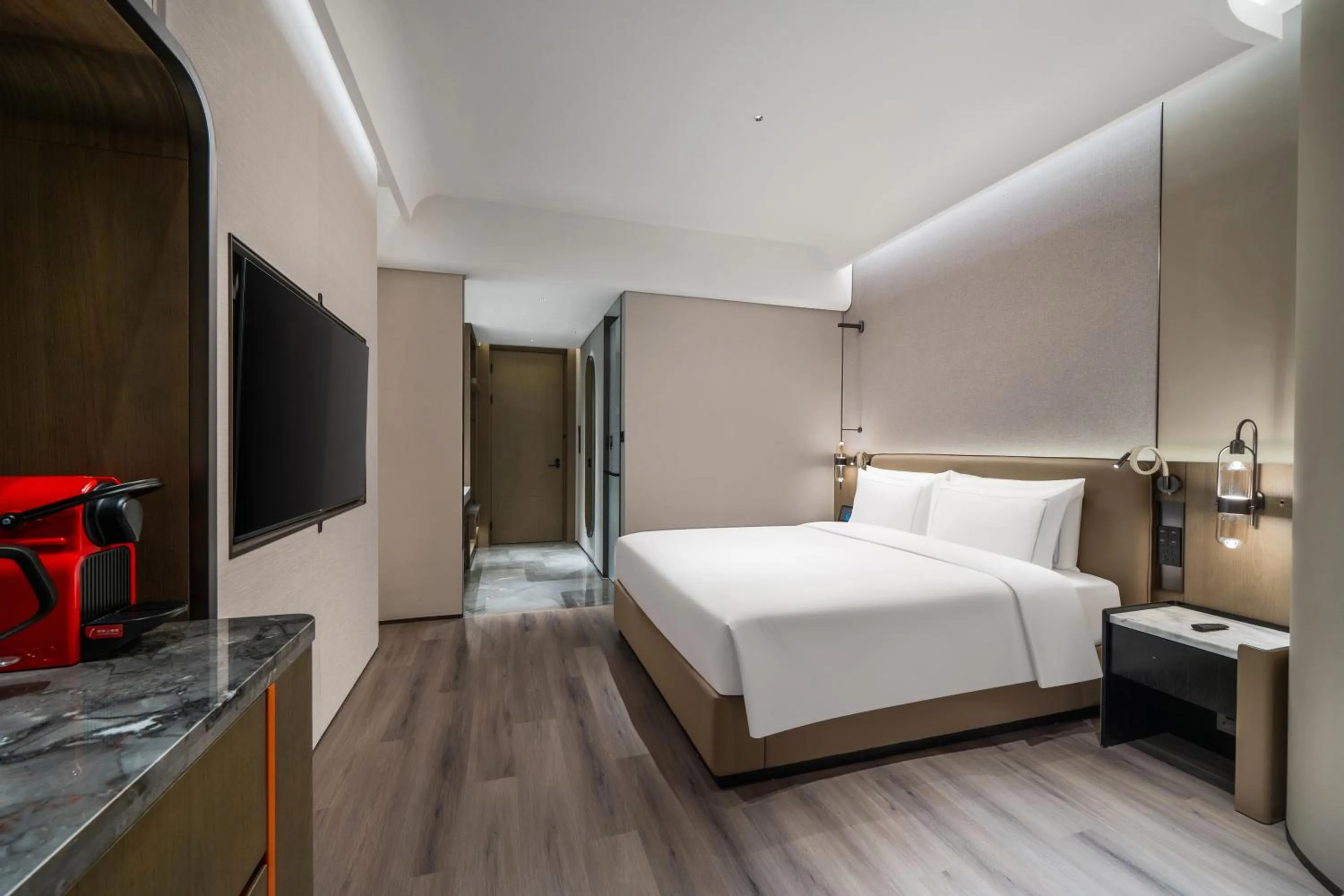 Bed in UrCove by Hyatt Shenzhen Bay Mixc