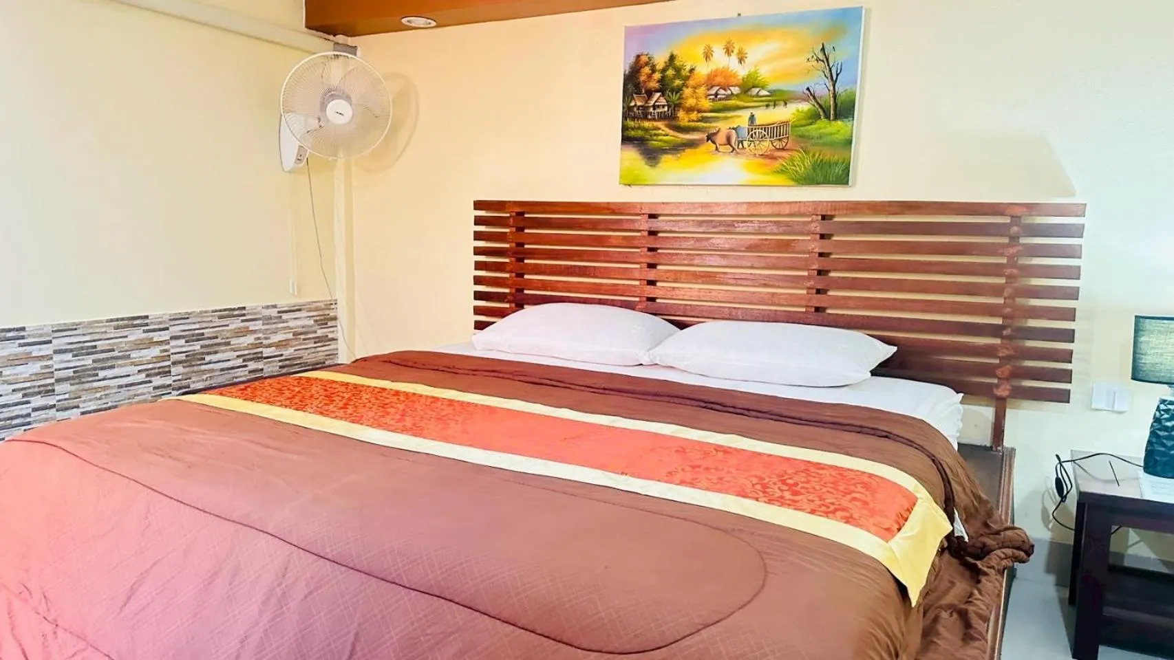 Bed in The Windsor Boutique Resort