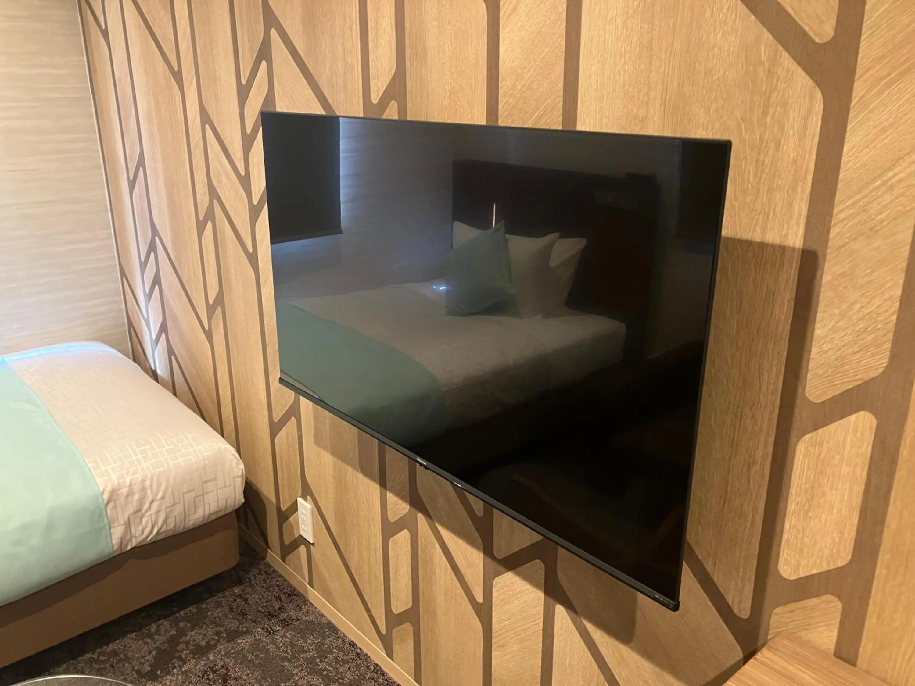 Bed in Hotel LiVEMAX Tendo