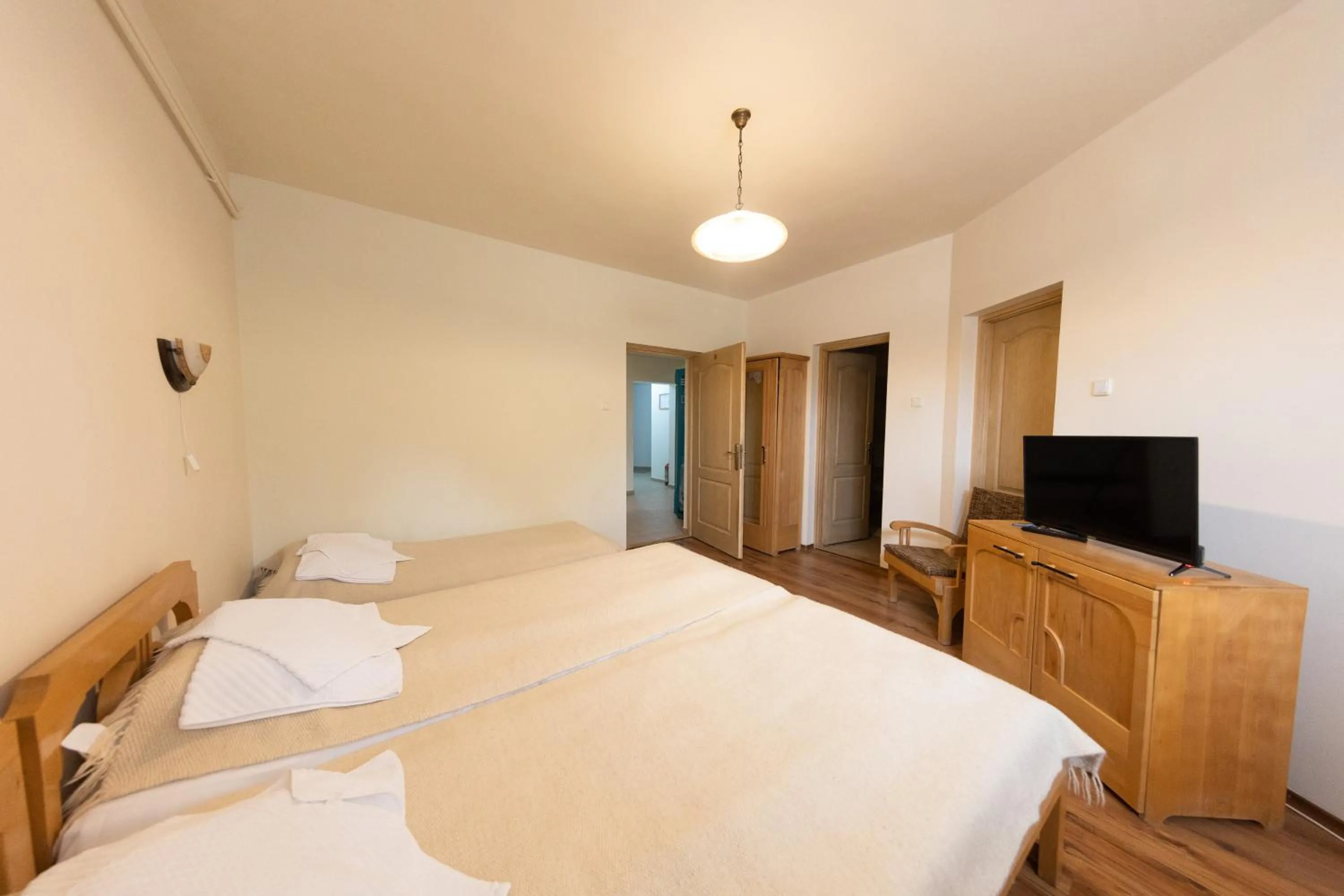 Bed in Pensiunea Bella Vita