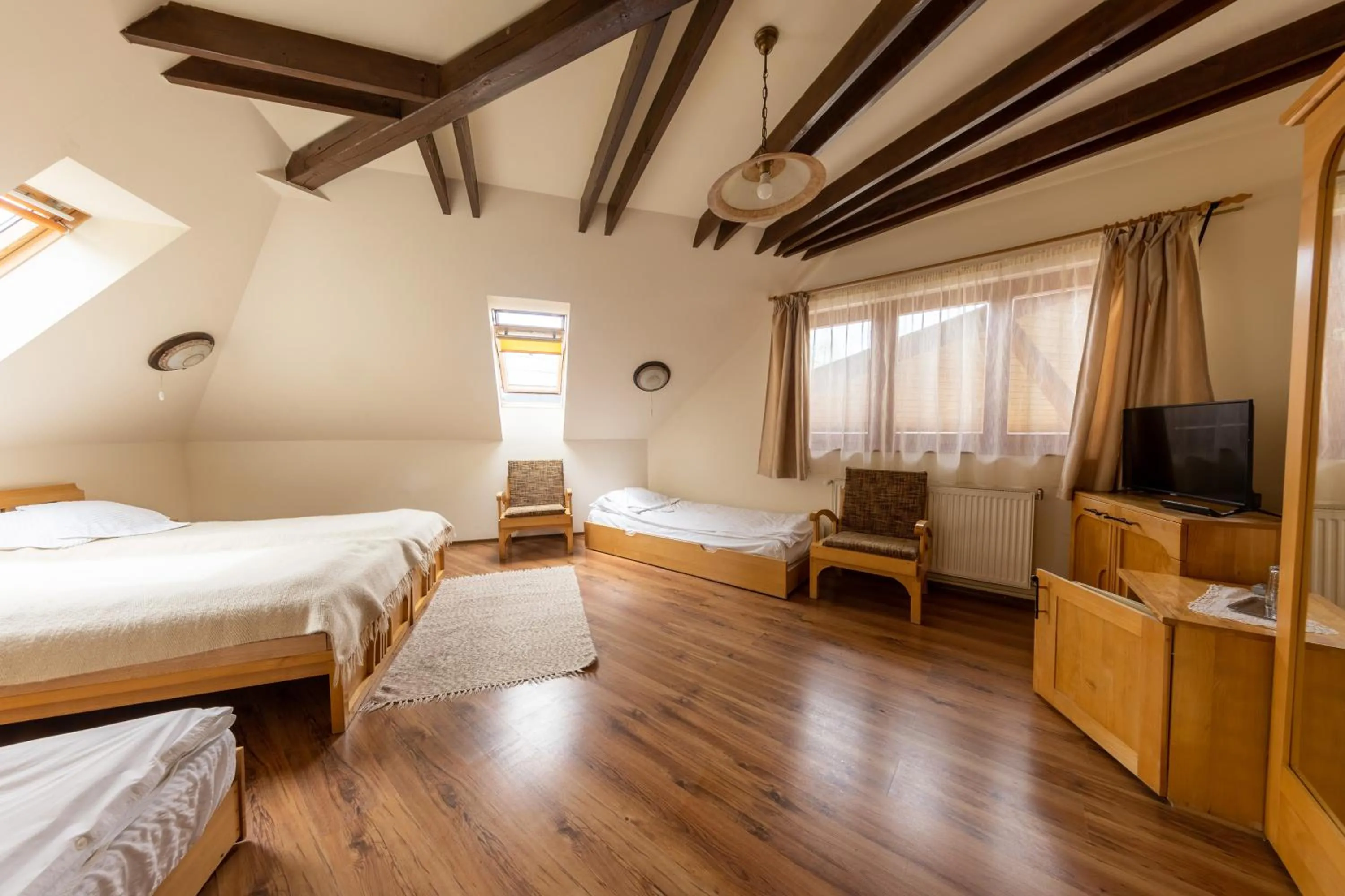 Bed in Pensiunea Bella Vita