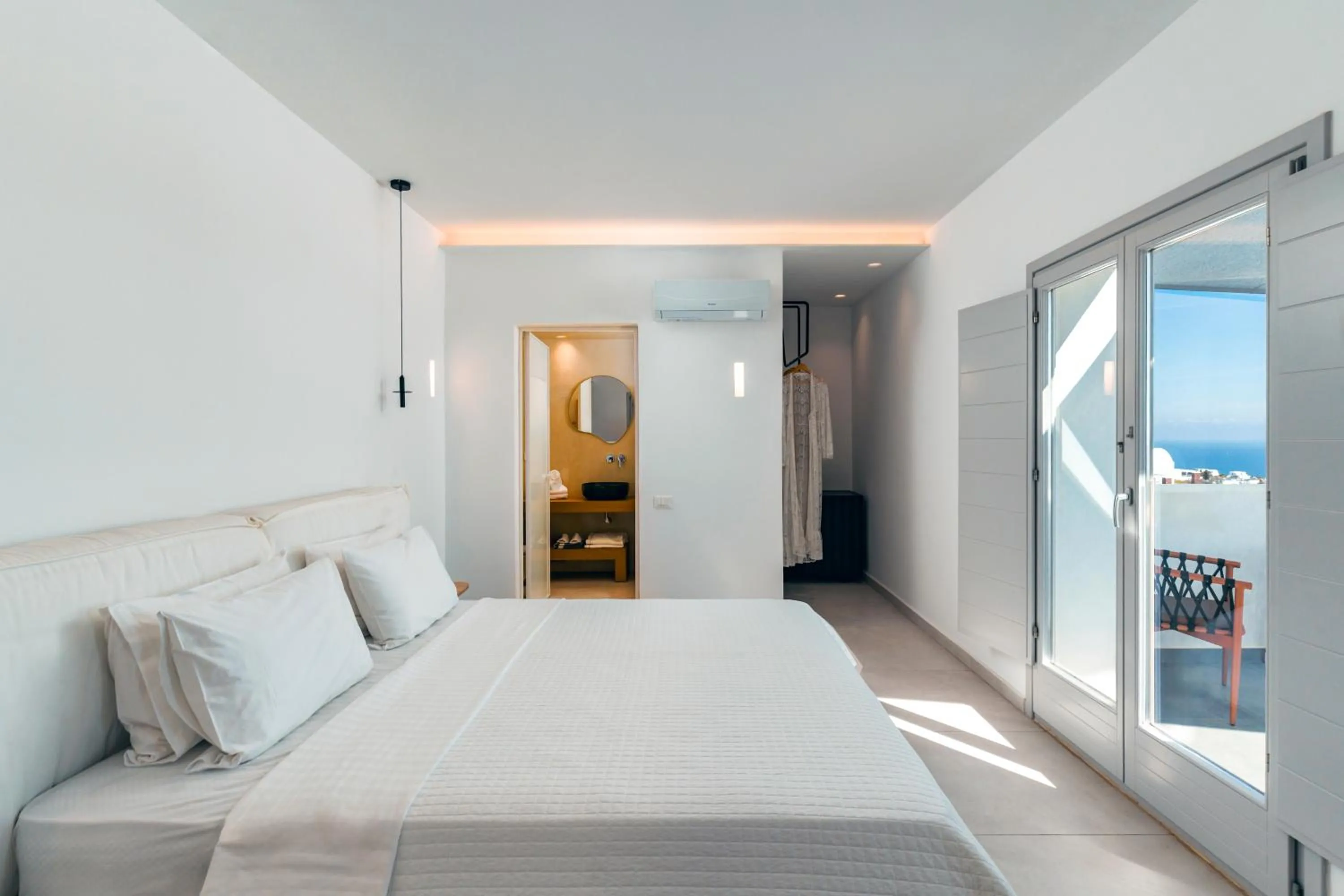Sea View One Bedroom Suite With Outdoor Jacuzzi in Oikos Santorini Living Concept